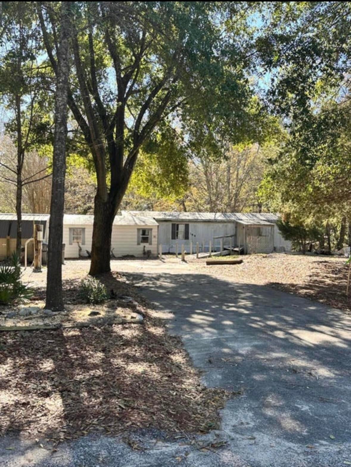 Don't miss this rare canal-front opportunity featuring 70 feet of waterfront with direct access to Choctawhatchee Bay! Situated high and dry in Flood Zone X with no HOA, this property offers exceptional flexibility to build your waterfront retreat or bring your RV and start enjoying the coastal lifestyle.

The property features a paved driveway, underground city water and electric, and a large septic system, with public sewer. Boaters will love being approximately 1.5 miles from the public boat ramp, while the beautiful beaches of the Emerald Coast are only about 20 minutes away.

The existing mobile home is considered to have no value and will require removal, leaving you with a blank slate to create your vision.

Waterfront. No HOA. Bay access. Flood Zone X. Opportunities like this are increasingly hard to find. Affordable waterfront living with incredible potential--priced to sell!