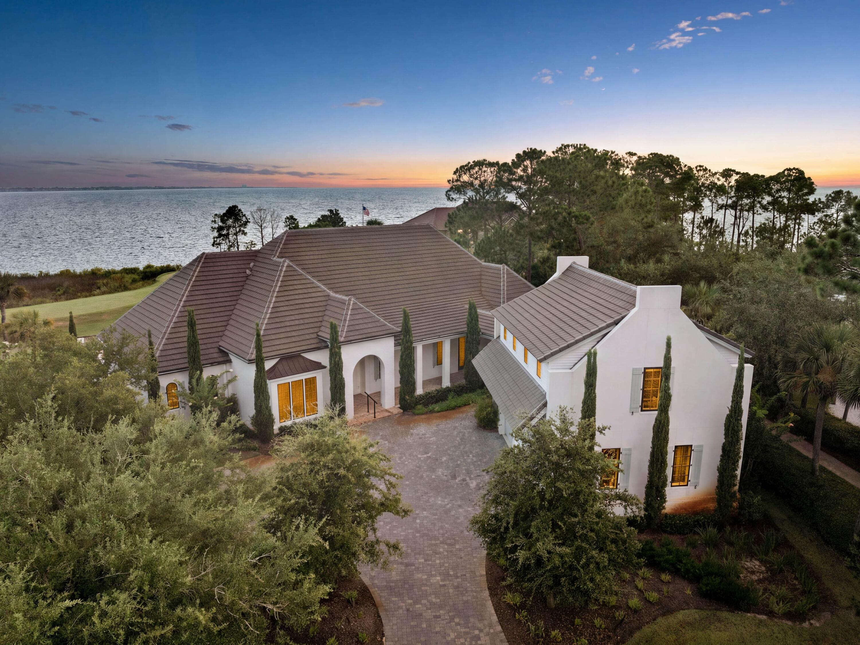 Positioned within the exclusive gates of Burnt Pine inside Sandestin Golf and Beach Resort, 3258 Burnt Pine Cove presents an extraordinary opportunity to create a one-of-a-kind custom estate in one of the Emerald Coast's most prestigious and tightly held enclaves.

This property is truly a blank canvas. The existing structure offers the ideal foundation for a complete custom transformation, allowing the next owner to reimagine every space with intention and precision. From architectural style and floor plan to finishes and outdoor living design, this is an opportunity to build a legacy residence tailored entirely to your lifestyle. Whether your vision leans toward modern coastal, timeless Mediterranean, or refined transitional, the setting supports something truly special.

The homesite itself is the irreplaceable asset. Perfectly positioned to capture unobstructed views of Choctawhatchee Bay, the property enjoys sweeping water vistas that create a constant connection to the natural surroundings. Sunrises shimmer across the bay, evening light reflects off the water, and the sense of openness and tranquility is immediate. In addition to the expansive bay views, the home overlooks the signature 14th hole of the Burnt Pine Golf Course, offering a rare dual perspective of water and championship golf.

This unique combination of bay views and golf course frontage creates a setting that is both dynamic and peaceful. The sightlines are protected, the elevation is strong, and the orientation of the structure maximizes natural light throughout the day. It is increasingly rare to find a property that delivers unobstructed bay views paired with this level of privacy and exclusivity.

Burnt Pine itself represents the pinnacle of luxury within Sandestin. Residents enjoy gated security, seclusion from the resort's busier areas, and access to championship golf, private beach access, a full-service marina, tennis, dining, and the expansive amenities that define the Sandestin lifestyle. It is a community known for its architectural quality, estate-sized homesites, and long-term ownership.

Opportunities to design and customize a residence with unobstructed Choctawhatchee Bay views in Burnt Pine are limited and becoming increasingly scarce. 3258 Burnt Pine Cove offers the chance to create something entirely your own in a setting that simply cannot be replicated, with protected water views, golf course frontage, and the prestige of one of the most sought-after addresses along the Emerald Coast.