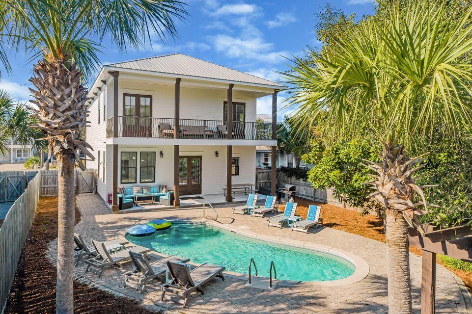 ''Take It Easy'' lives up to its name -- a turnkey, income-producing retreat on the east side of Crystal Beach. Located only a short walk to the sugar white sands of the Pompano Beach Access. Six bedrooms, six full baths, sleeps 16, with two living areas (one per level) and an open layout built for big groups and even bigger bookings. Out back is the showstopper: a private heated pool, pavered patio, swaying palms, and parking for four. Inside, everything's done -- fresh paint, five new walk-in showers, updated kitchen, shiplap walls/ ceilings and arcade game system that guests love. The big-ticket items are handled too: metal roof, tankless water heaters (2022), impact-rated hurricane glass and dual HVAC.  This property comes with something rare: its own professional website, designed exclusively for this home. Hosting a boutique-hotel design and professional SEO tuning that leads to higher rankings resulting in more captured bookings. That's marketing edge that most homes in this class don't have. Sold fully furnished, rental-ready, it's a proven six-figure producer earning from day one. No HOA. Flood Zone X. Not in a Cobra Zone. With room to expand to seven or eight bedrooms, the upside is already built in. Homes like this don't last in Crystal Beach -- see it before the next owner does.