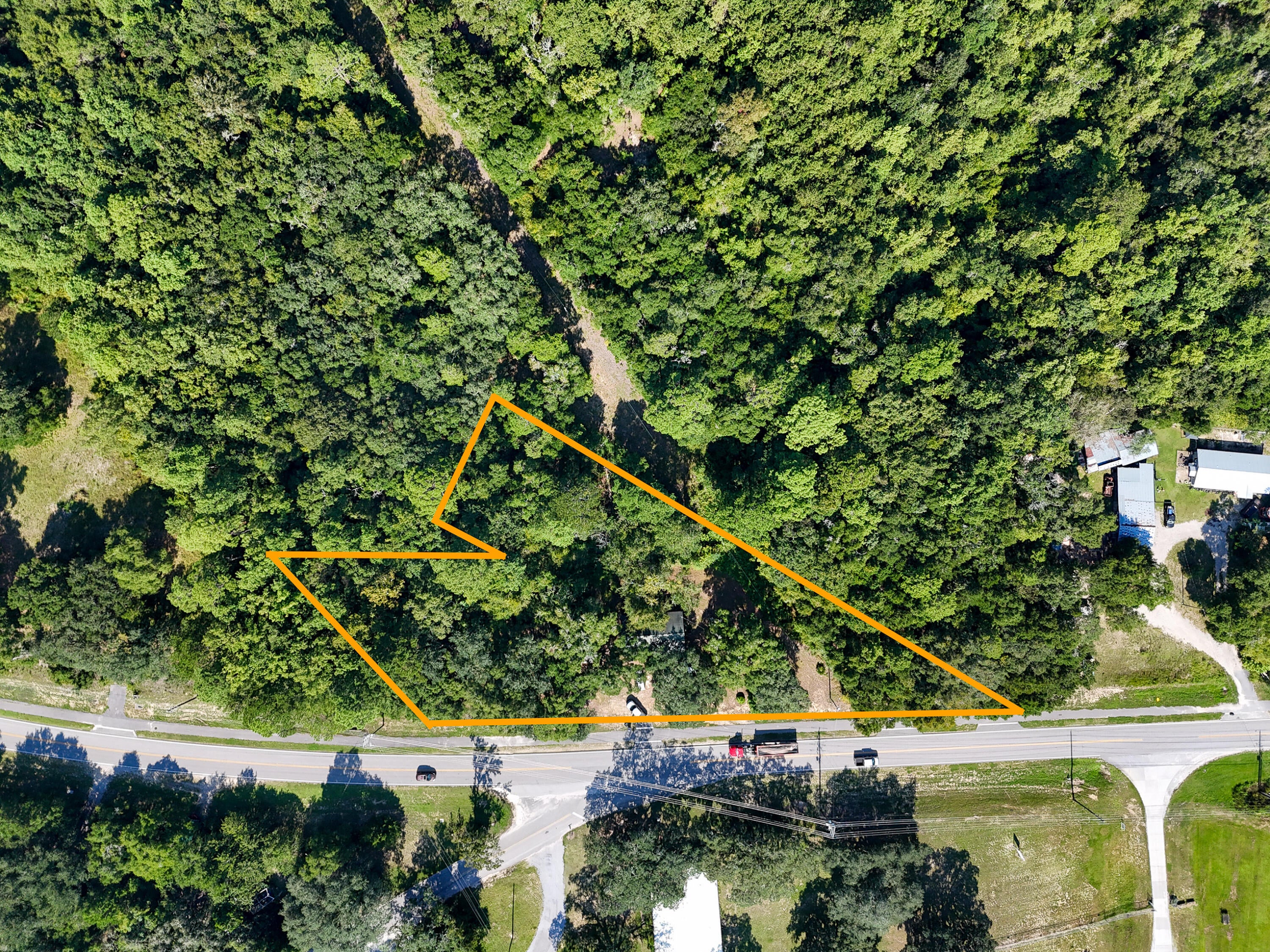 Discover a rare opportunity in the heart of Freeport! Situated on approximately 1.84 acres, this property at 700 County Hwy 83A E offers a unique combination of space, location, and convenient access to the water. Zoned Rural Residential within the City of Freeport, the property provides plenty of room to create your vision while enjoying the relaxed lifestyle that makes this area so desirable.

Outdoor and boating enthusiasts will especially appreciate the location directly across from a public boat launch, offering easy access to beautiful 4 Mile Creek and the surrounding waterways of the Choctawhatchee Bay area. Launch the boat, kayak, or paddleboard and spend the day exploring some of Northwest Florida's most scenic waters--all just steps from home.

With approximately 1.84 acres, the property offers room for a residence, outdoor living areas, boats, recreational equipment, and more, subject to applicable zoning and development requirements. The spacious setting provides a hard-to-find combination of acreage and convenient access to Freeport amenities.

Whether you're looking for a homesite, recreational retreat, or an investment opportunity in one of Walton County's growing communities, this property deserves a closer look. Enjoy the laid-back Freeport lifestyle with boating and fishing practically at your doorstep!