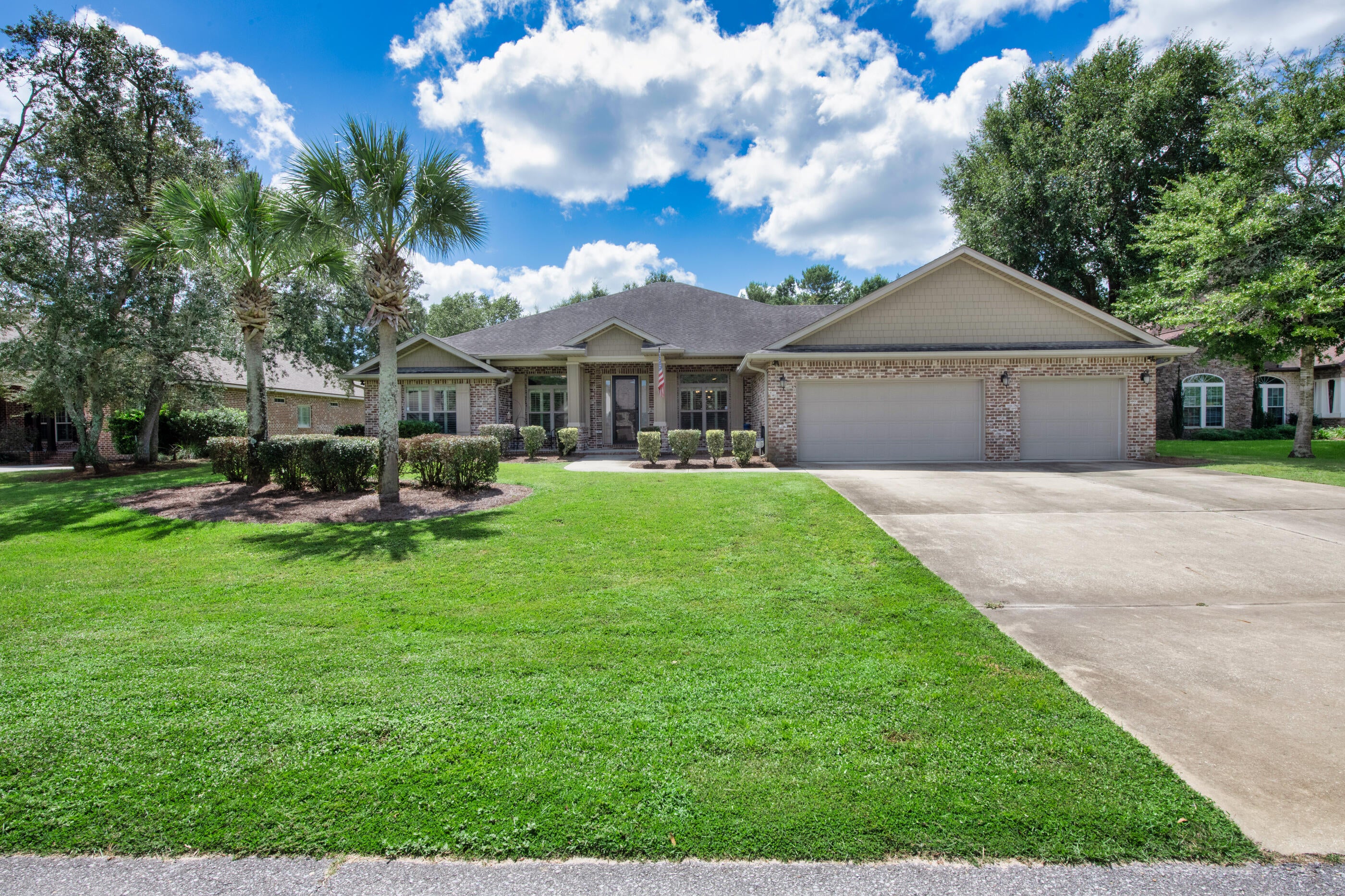 Golf course living with plenty of room to spread out! Located right on the 11th hole of Hidden Creek Golf Course, this spacious 4 BR, 3 BA home also offers an office, additional bonus room, formal dining room, & breakfast nook--giving you plenty of options for work, guests, hobbies, and everyday living. The open floor plan makes entertaining easy, with a living room featuring a coffered ceiling & electric fireplace. The kitchen is ready for the cook in the family with custom cabinetry, breakfast bar, granite countertops, natural gas cooktop, double ovens, & a convenient breakfast nook. All bedrooms were updated with wood laminate flooring in 2025. The mudroom/laundry room is a standout with custom cabinetry, granite countertops, copper farm sink, & an extra refrigerator--because you can never have too much storage (or fridge space!). And then there's the 660-square-foot screened-in covered patio overlooking the golf course. With access from the primary bedroom, living room, & hallway near the third bathroom, it's the perfect spot for morning coffee, relaxing after a round of golf, or entertaining friends while enjoying the view. The primary suite offers a spacious retreat with patio access & a bathroom featuring dual vanities with dressing area, granite countertops, separate tiled walk-in shower, garden tub, wash closet, & an EXPANSIVE closet you just have to see for yourself! Additional features include spray foam insulation in the attic, a natural gas whole-house generator, & a tankless gas water heater installed in 2024. Golf course views, flexible living space, a seriously impressive outdoor area, & thoughtful features throughout--this one is ready to be enjoyed!