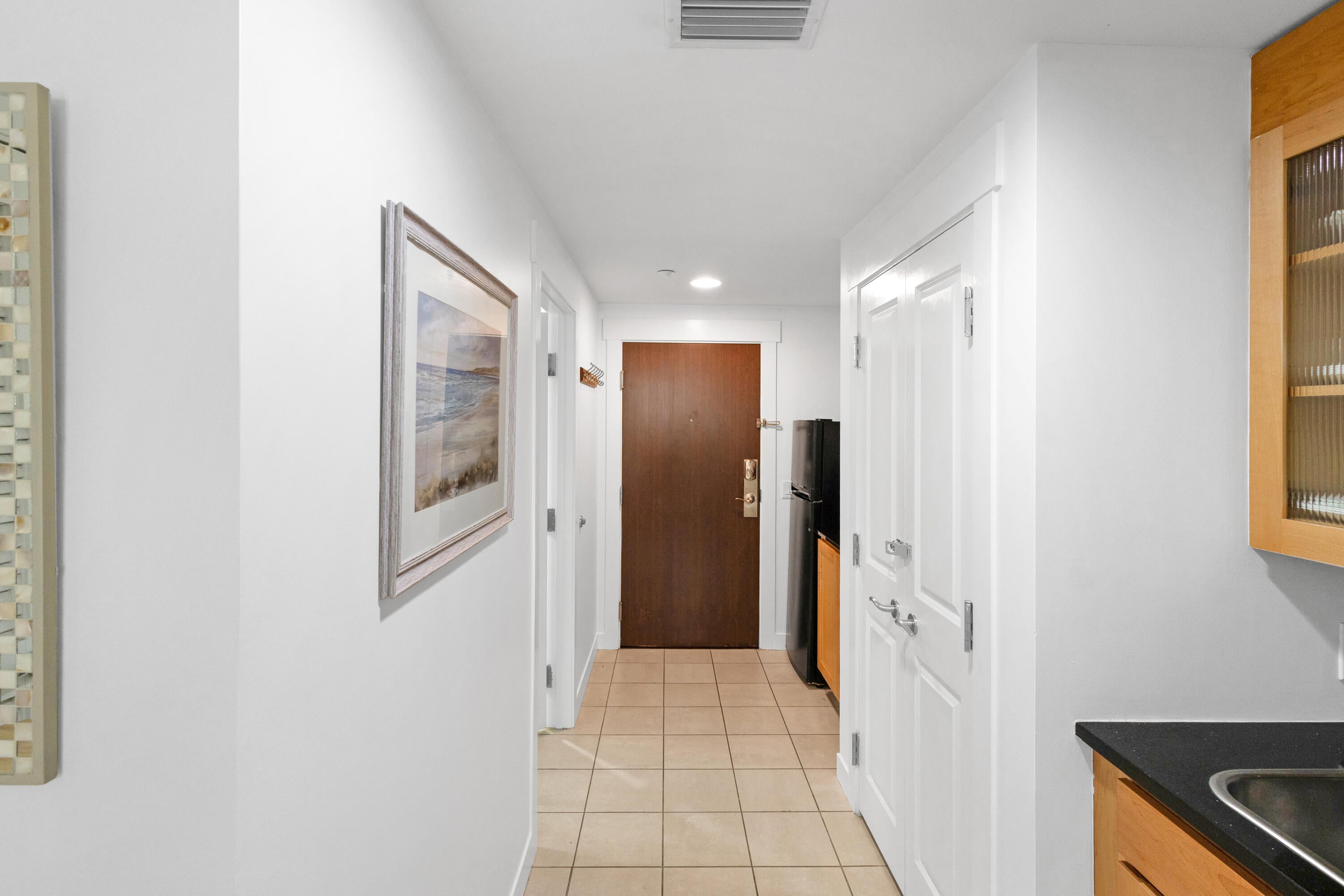 This 3rd floor condo is a must see! FULLY FURNISHED AND INCLUDES ALL UTILITIES! Available for a 1 year lease!! This larger studio floor plan feels like a 1-bedroom with a separate living area, kitchen, sleeping area, and two large windows welcoming in lots of natural lighting.  Studio has upgraded full size fridge/freezer combo with a separate counter for extra food prep or appliance storage. Granite countertops and added cabinet space! Come and enjoy all that resort life has to offer!