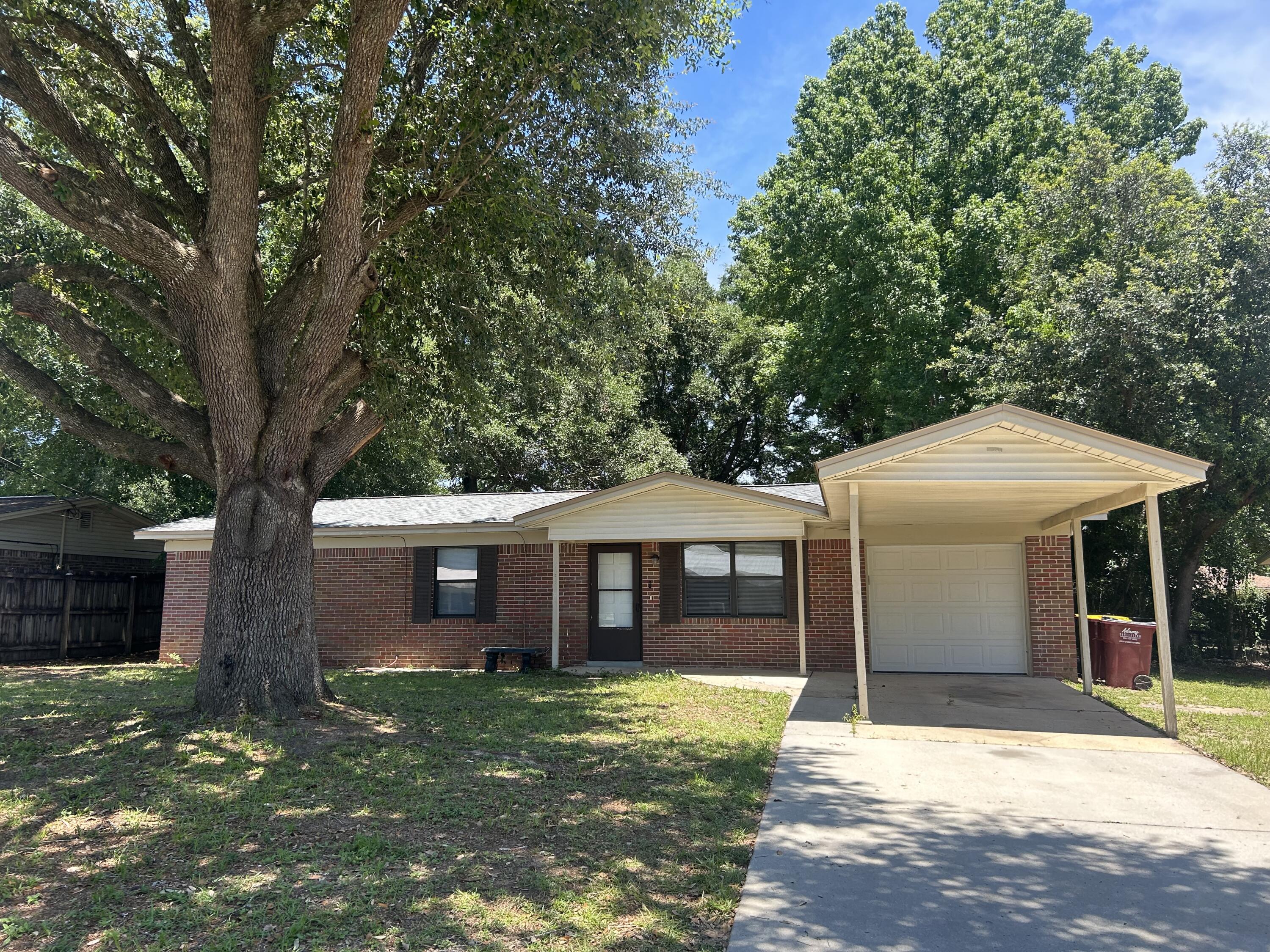 3 Bedroom 2 Bath Brick Home, Brand New Stainless Appliances & Vinyl Plank Flooring in Living Area, 1 Car Garage with Tile, Freshly Painted Throughout, Fenced Back Yard,