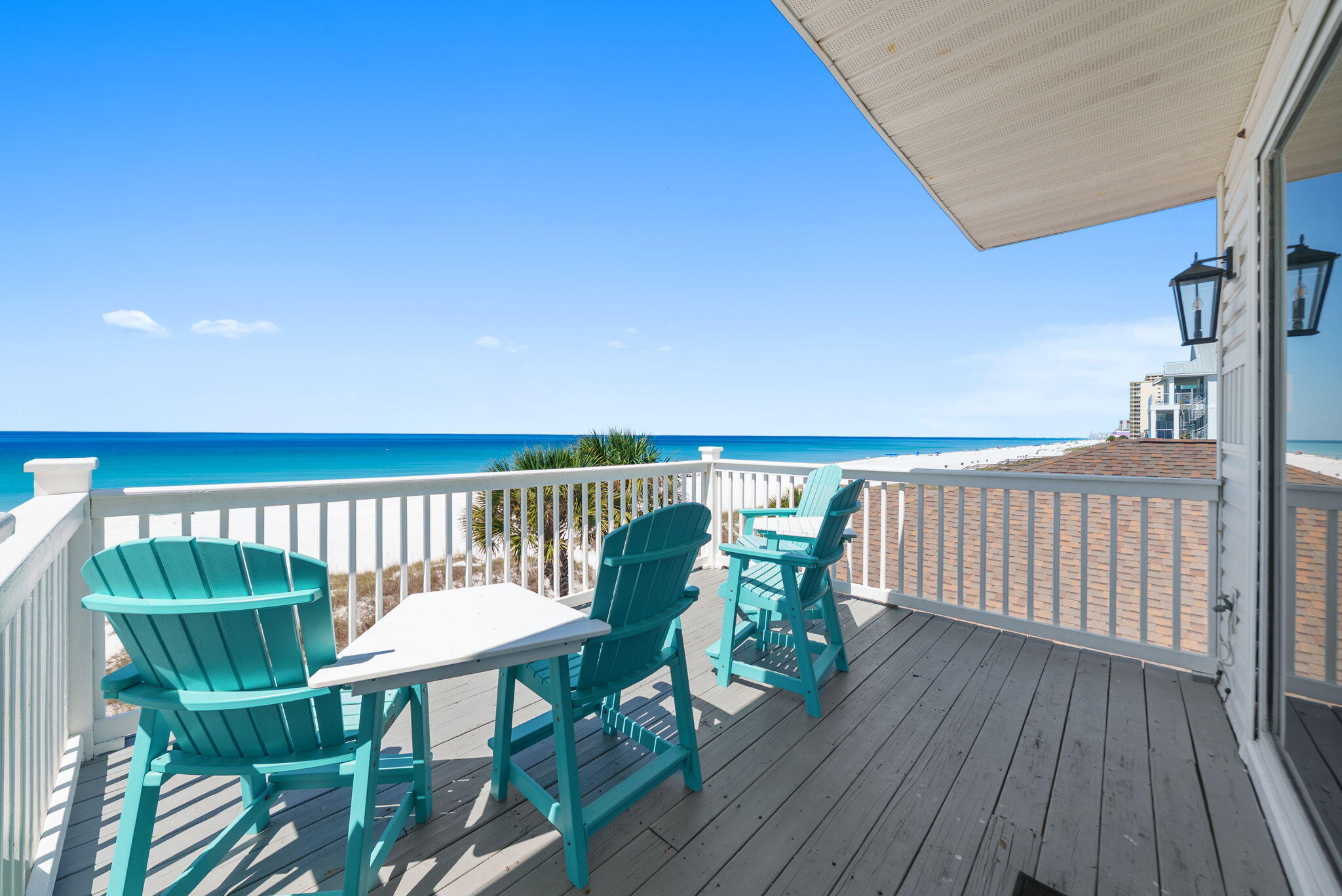 An exceptional Gulf-front investment opportunity where luxury meets income potential. With more than $330,000 in proven rental income in 2025. This stunning coastal property features four beautifully appointed two-bedroom units, offering a total of 8 bedrooms and 8 full bathrooms, all thoughtfully designed to maximize comfort, style, and revenue. Perfectly positioned directly on the Gulf, the property showcases breathtaking Panama City Beach sunsets and uninterrupted water views from private balconies for every unit, creating an unforgettable experience for guests and owners alike. A Gulf-front pool provides the ultimate setting for relaxation, while the pristine white sand beach is just steps away. Inside, each residence is finished with upscale coastal touches, including gorgeous white oak luxury vinyl plank flooring, open-concept kitchens, and striking shiplap ceilings that enhance the bright, airy atmosphere throughout. The layout of each unit is designed for both functionality and entertaining, making it ideal for short-term rentals or multi-family use. On the ground level, covered parking beneath the home offers both convenience and additional entertainment space, complete with grilling areas, tables, games, and gathering spots--perfect for hosting guests and creating memorable beachside experiences. With rental projections reaching as high as $385,000 per year, this property presents a rare opportunity to own a premier Gulf-front income-producing asset in one of Panama City Beach's most desirable locations. Whether you're expanding your portfolio or seeking a luxury coastal retreat with exceptional returns, this one-of-a-kind property delivers the perfect blend of location, lifestyle, and long-term value.