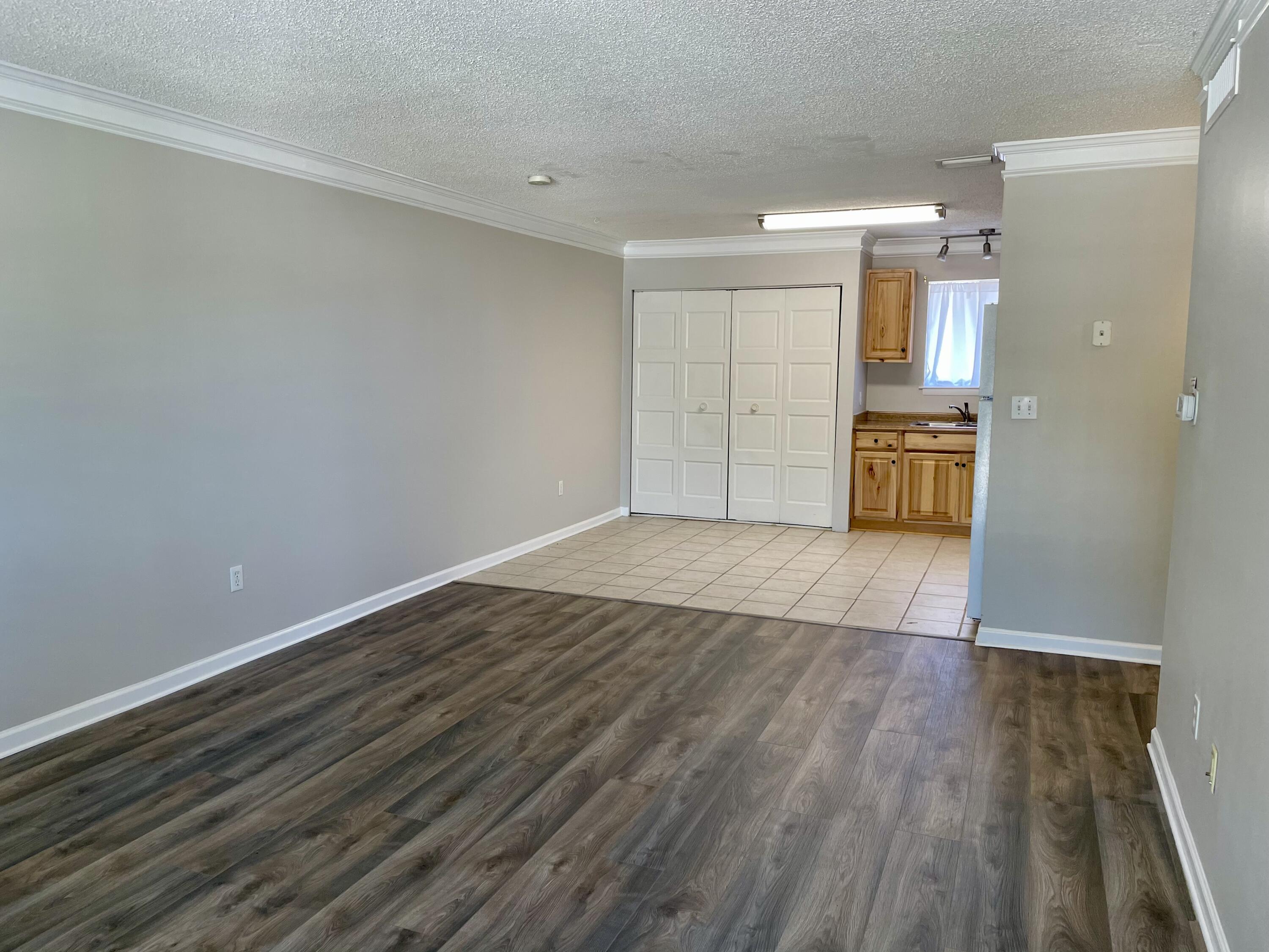 Updated 2 Bedroom/1 Bath condo features vinyl plank flooring throughout living room and bedrooms. The kitchen has updated wood cabinets, new dishwasher, large pantry and space for dine-in area. The unit is located on the end of the 2nd floor, with no units above. Complex amenities include community pool, laundry facilities, assigned parking space and BBQ/picnic area. No smoking permitted. Water, trash and pest control included.
