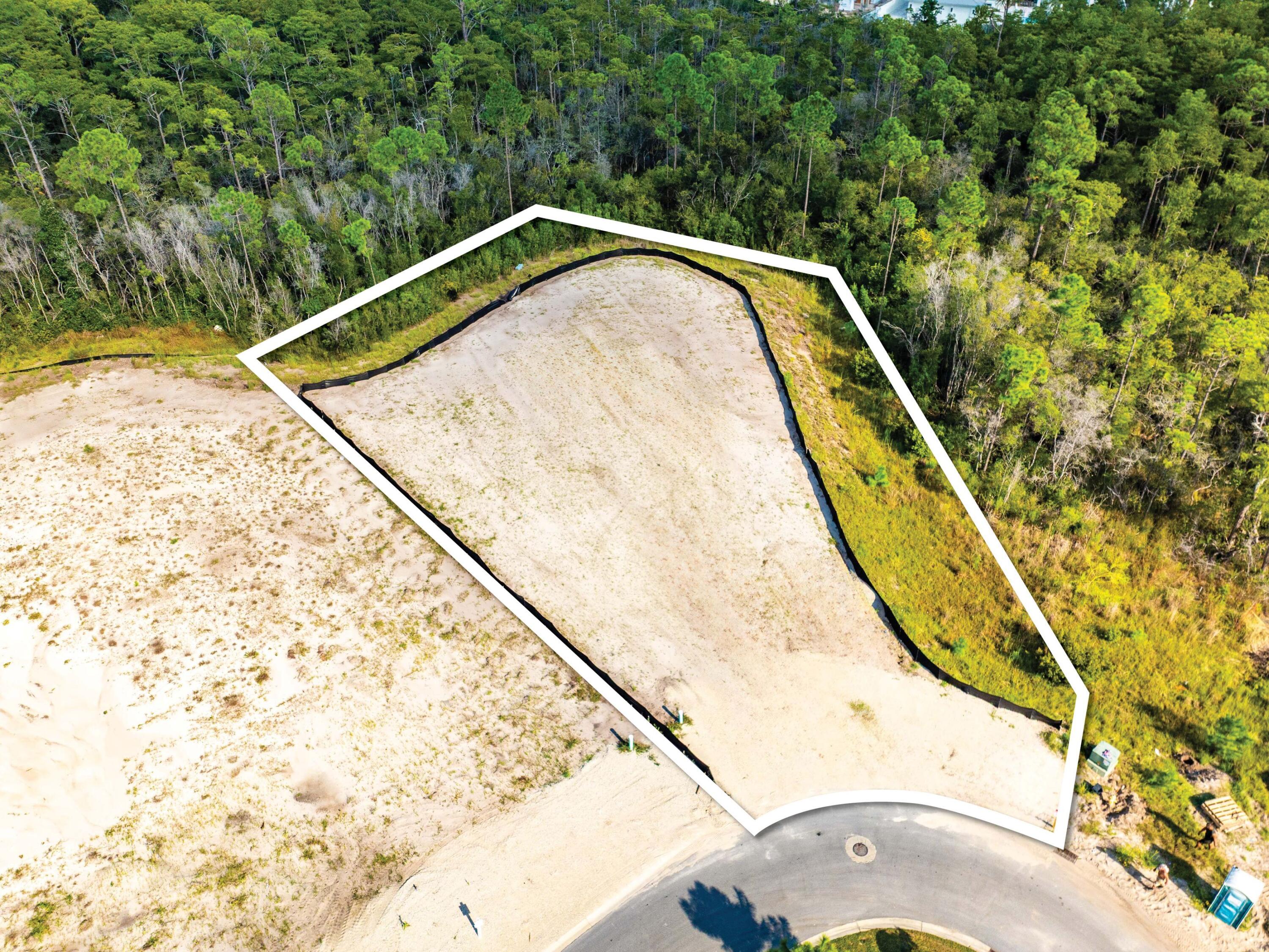 A rare opportunity awaits to build your custom dream home in the prestigious gated community of Watersound Camp Creek. This almost HALF ACRE homesite is ideally positioned on a desirable corner location at the end of a quiet cul-de-sac, this exceptional property backs to a wooded preserve and has no neighboring home on one side, creating an uncommon sense of privacy and seclusion.
Ownership in Watersound Camp Creek offers exclusive membership opportunities to the renowned Watersound Club, with access to an extraordinary collection of amenities and experiences. Members enjoy three championship golf courses, including the Tom Fazio-designed Camp Creek Golf Course and the acclaimed Davis Love III-designed The Third. Additional amenities include complimentary beach chair and umbrella service at the Gulf-front Beach Club, an expansive 11,000-square-foot wellness center, resort-style pools, exceptional tennis and pickleball facilities, and an impressive selection of private dining venues and exclusive club amenities.
This exceptional homesite offers the opportunity to create a truly private retreat while enjoying one of the most sought-after club lifestyles along the Emerald Coast. A special offering in an extraordinary community.