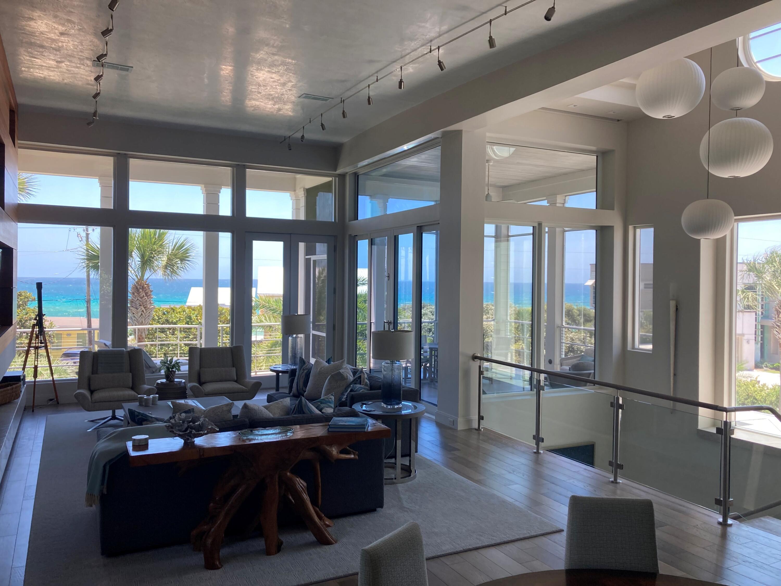 This expertly designed home at 461 Blue Mountain Road has been exclusively enjoyed as a private retreat and never rented, preserving its pristine condition. Featuring four bedrooms, an additional office / bunk room, four full bathrooms, and two half bathrooms, the layout is designed for both effortless entertaining and quiet relaxation.
This perfectly positioned home captures breathtaking southwestern panoramic gulf views, and refreshing coastal breezes. Just steps from the sugar-white sand beaches via a deeded neighborhood walkover and beach access directly across the street.  This location offers both convenience and exclusivity.
Designed with clean architectural lines and timeless elegance, this fully integrated smart home showcases high-end finishes, quality fixtures, top of the line appliances, elevator, and sophisticated coastal style throughout. Spacious living areas and carefully selected design details create an inviting atmosphere ideal for beach living.