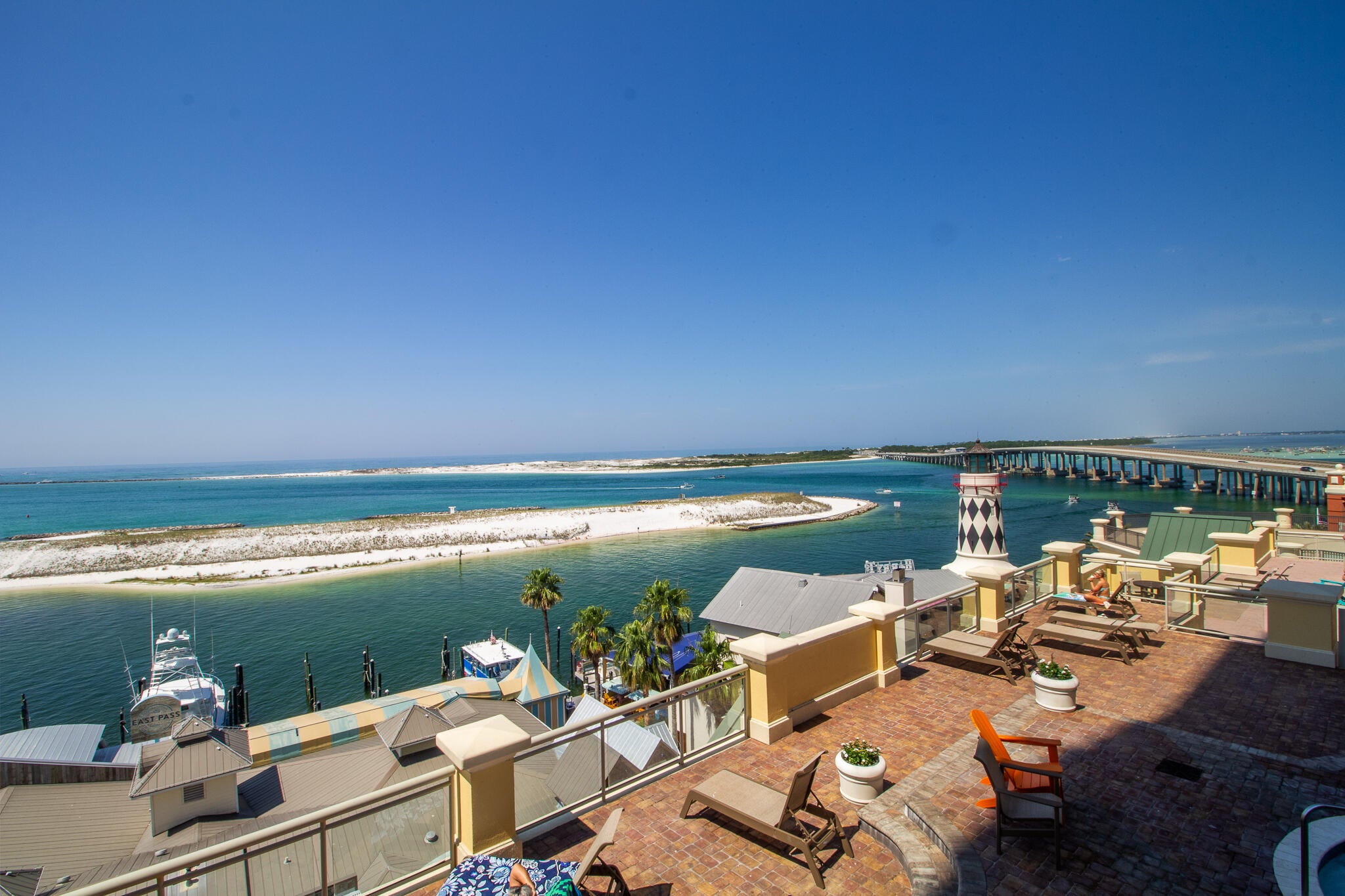 Fractional Ownership - Share D for Sale. Own a 1/8 fractional share with 6 weeks of annual usage and enjoy Destin in every season. This stunning 3-bedroom, 3-bath corner residence offers panoramic views of Destin Harbor, East Pass, the Gulf, and Crab Island, along with 500+ square feet of wraparound balcony space. Enjoy resort-style amenities including a pool, two hot tubs, spa, fitness center, 24-hour front desk, bell service, onsite dining with room service, and beach service with chairs and umbrellas. Best of all, you're just an elevator ride from HarborWalk Village's shopping, dining, entertainment, and waterfront activities. This is an exceptional opportunity to own a piece of Destin's premier resort lifestyle without the commitment and expense of full ownership.