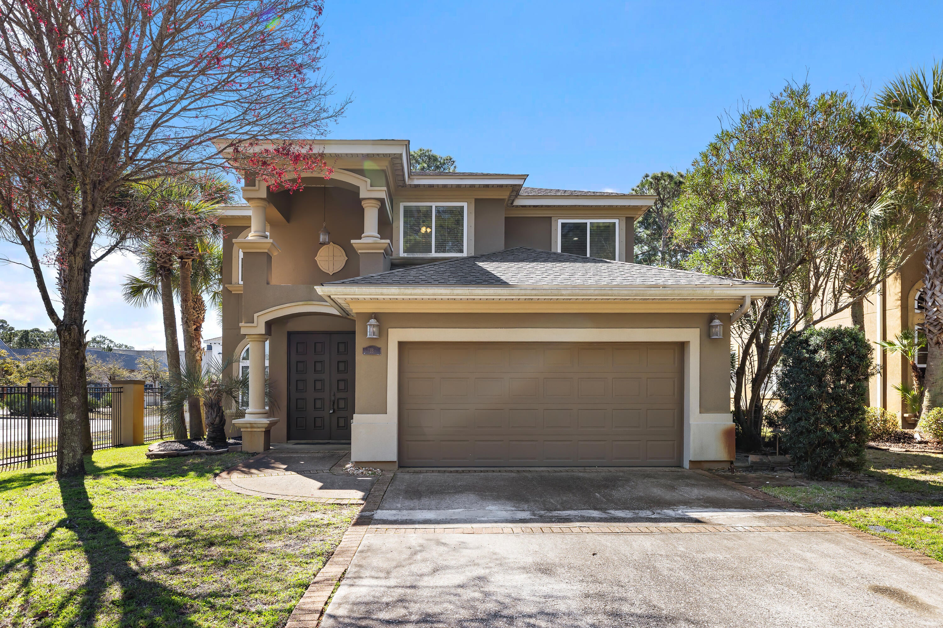 Discover the perfect blend of coastal charm and everyday comfort in this beautifully maintained home located in the desirable Baywalk Landing community of Miramar Beach. Just one mile to the sugar-white sands of the Gulf at the South Walton Beach Access, premier dining, and upscale shopping of the Silver Sands Premium Outlets, this home also offers the rare bonus of being only a short block from the bay and scenic Legion Park.
Built in 2006, this two-story Mediterranean-style residence offers timeless appeal. Inside, you will find thoughtful upgrades throughout, including travertine flooring, rich cherry cabinetry, granite countertops, and stainless steel appliances.