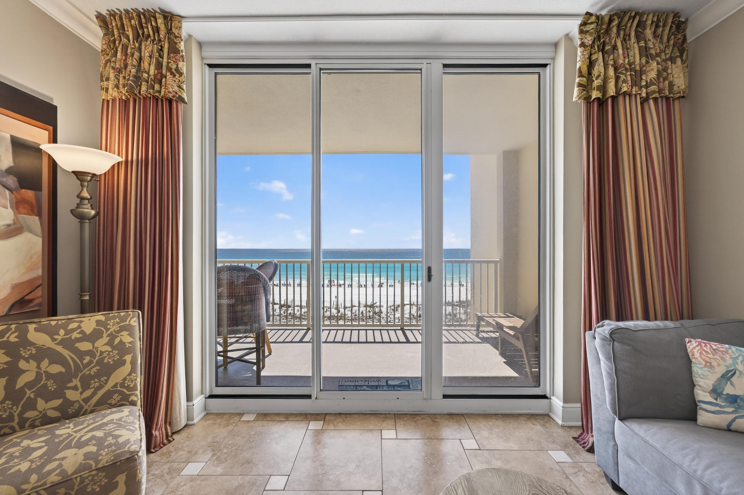 Gulf-front living at its finest -- and the smartest value on this floor plan in the building. This 1,513 SF, 3BR/3BA residence at Azure offers direct, unobstructed Gulf views, an open living and dining layout, and a primary suite with garden tub, walk-in closet, and private balcony access. A private owner's closet inside the unit plus a dedicated storage room down the hall add everyday convenience most buyers won't find elsewhere in the building.

Only four units in Azure share this exact floor plan -- and this is priced below the two others currently on the market, and below the most recent unit of this same layout to sell in the building. A documented rental income history is available for buyers evaluating this as an investment, along with a full cost-to-own analysis built on real numbers, not projections.

Wake up to sugar-white sand and emerald water from your own balcony, with sweeping Gulf views from the main living areas and primary suite alike. The split-bedroom layout gives guests and owners their own private corners. Resort amenities include a Gulf-front pool, fitness center, and secured building access -- everything you need for a low-maintenance coastal lifestyle.

Tour remotely first with our 4K Matterport walkthrough, then schedule an easy, flexible in-person showing through our team. Whether you're searching for a primary residence, a second home, or an income property, this is Gulf-front ownership positioned to perform. Schedule your private showing today. FULL COMPARABLE ANALYSIS -- AZURE, 1,513 SF / 3BR-3BA FLOOR PLAN

Only four units in the building share this exact floor plan. Here is where this listing sits against the others:

Unit Status Price $/SF Notes

307 Sold $1,000,000 $660.94 Closed Jan 2026, 101 DOM

610 Sold $1,075,000 $710.51 Closed Jan 2026, 53 DOM

113 Active $1,095,000 $723.73 Priced above subject

305 Active $1,100,000 $727.03 Priced above subject

414 (subject) Active $1,070,000 $707.20 Below actives and last closed sale


CLOSED SALES (this floor plan): - Unit 307 -- sold $1,000,000 ($660.94/SF) -- closed January 2026, 101 days on market - Unit 610 -- sold $1,075,000 ($710.51/SF) -- closed January 2026, 53 days on market

ACTIVE LISTINGS (this floor plan): - Unit 113 -- listed $1,095,000 ($723.73/SF) - Unit 305 -- listed $1,100,000 ($727.03/SF) - Unit 414 (this listing) -- listed $1,070,000 ($707.20/SF)

This listing is priced below both active competitors on the identical floor plan, and below the most recent closed sale of this exact layout -- Unit 610, which sold for $1,075,000. In plain terms: a buyer purchasing this unit at ask is paying less than what the last verified buyer in this building paid for the same square footage, same bedroom count, same view line.

MARKET TIMING CONTEXT: Both recent Azure sales on this floor plan went under contract within days of each other in December 2025 -- a pattern consistent with holiday-season visitors converting into buyers. Showing volume in Azure and the surrounding Gulf-front buildings slows through the peak rental season (spring and summer), then picks back up as the building empties out heading into fall. Consistent with that pattern, another Azure residence went under contract this month (July 2026) after a longer stretch on the market -- an early signal that buyer activity in the building is returning as the summer rental season winds down.

RENTAL INCOME HISTORY (verified actuals, four years): - 2023: $70,000 - 2024: $75,000 - 2025: $60,000 (property management transition year) - 2026: year-to-date through July 1, plus July and August currently on the books

A full cost-to-own analysis with cap rate detail is available on request -- built entirely on these actuals, not third-party rental estimates.

FEATURES: Private owner's closet inside the unit; dedicated storage room down the hall; primary suite with garden tub, walk-in closet, and private balcony access; recently updated living room seating. 4K Matterport virtual tour and floor plan available.