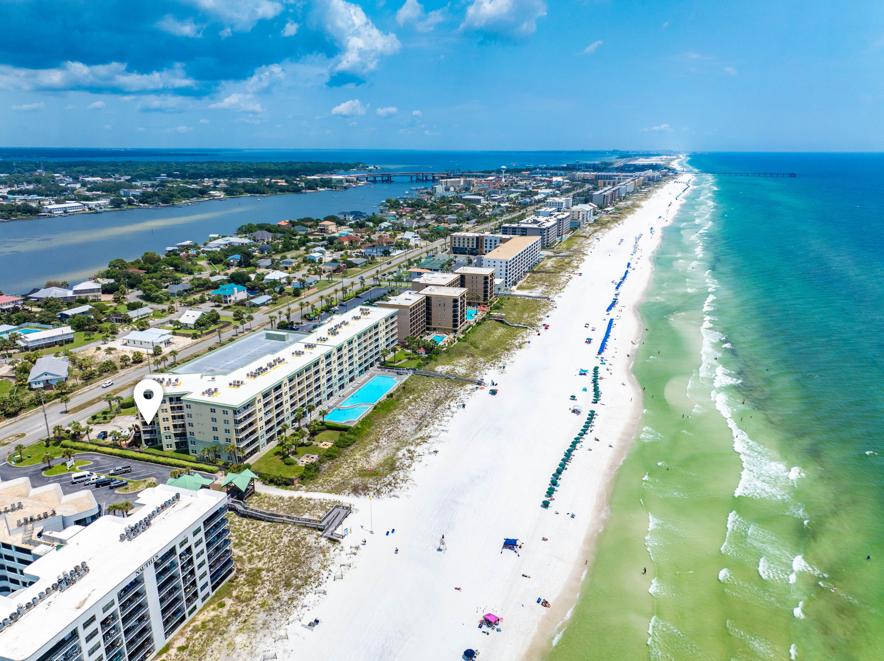 Beautifully updated and ideally positioned at Waters Edge on Okaloosa Island, Unit 301 offers a turnkey opportunity for those seeking a second home, vacation retreat, or income-producing property along Florida's Emerald Coast.

The interior has been thoughtfully renovated with a fresh coastal feel, featuring quartz countertops, white shaker cabinetry, a custom backsplash, luxury vinyl flooring, and an inviting open living area with a fireplace. The private balcony provides outdoor living space with views toward the Gulf and Santa Rosa Sound, while the unit's location offers convenient access to everything that makes Waters Edge such a desirable beachfront community.

Owners and guests enjoy direct beach access, a large seasonally heated Gulf-front pool, fitness center, covered parking, elevators, grilling and picnic areas, and additional community amenities. Offered furnished and ready to enjoy, the property also offers strong vacation rental appeal for buyers looking for the flexibility to use the condo personally while generating rental income when they are away.

With its updated interior, beachfront setting, excellent amenities, and convenient Okaloosa Island location, Unit 301 is an exceptional opportunity to own along the Gulf Coast.