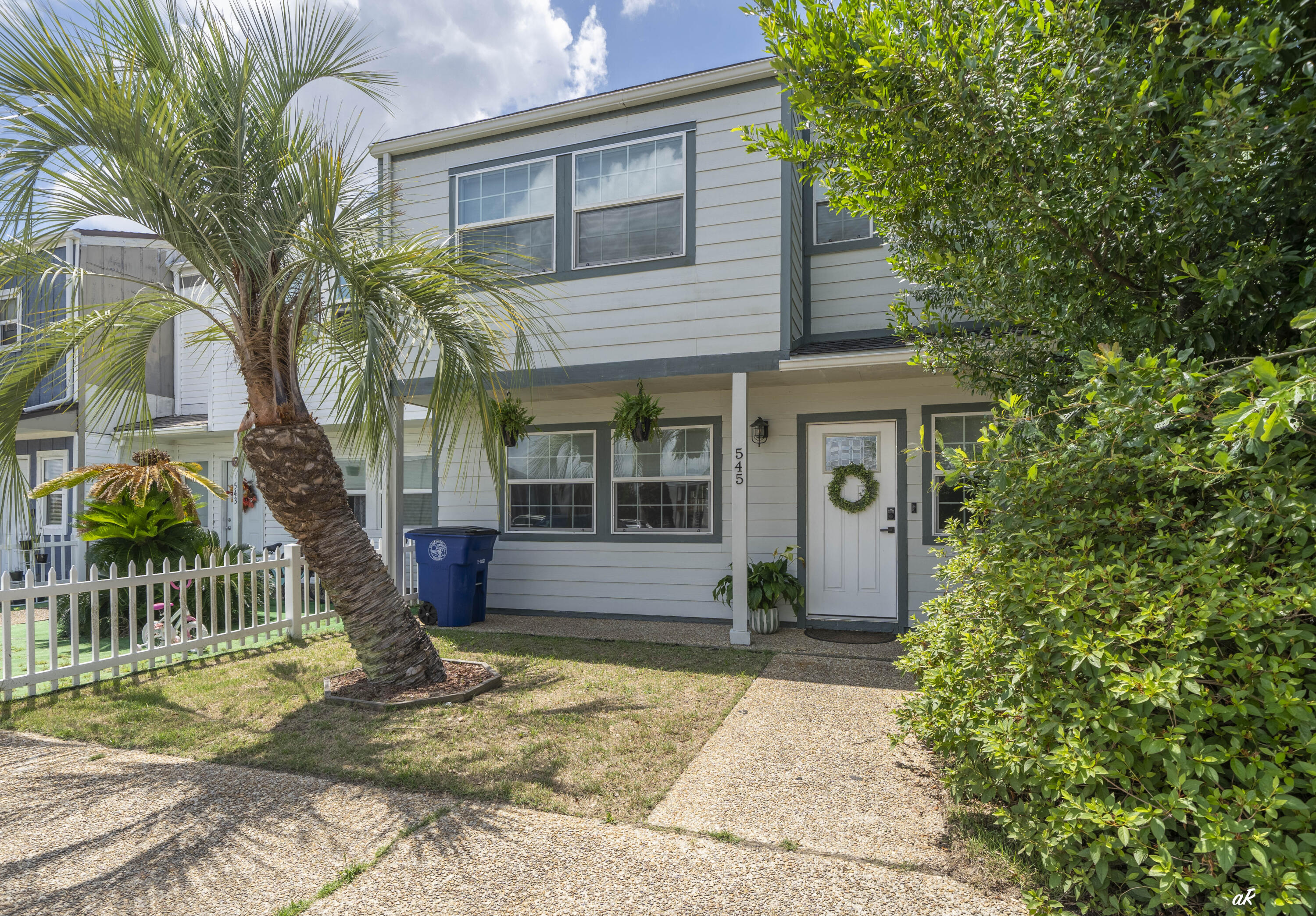 Welcome to 545 Palermo! This charming 3-bedroom, 2.5-bath townhome is conveniently located between Lynn Haven and Panama City, close to shopping, dining, and some of Bay County's top schools. With over 1,300 square feet of living space, the home offers a comfortable layout ideal for everyday living or entertaining. Inside, you'll find tasteful finishes throughout, including luxury vinyl flooring in the main living areas, granite countertops, stainless appliances, and updated cabinetry in the kitchen. The spacious living areas and natural light create a warm and inviting feel throughout the home. The backyard is a standout feature with privacy fencing and no rear neighbors as the property backs up to a preserve, creating a peaceful setting to relax or entertain. Located just minutes from Publix, Starbucks, local restaurants, gyms, parks, and everyday conveniences, this home is perfectly positioned for an active lifestyle. Enjoy nearby sidewalks for walking or running, quick access to the bay for fishing and boating, and convenient proximity to local churches and community amenities. Well maintained and perfectly move-in ready, this home offers comfort, convenience, and value all in one.
