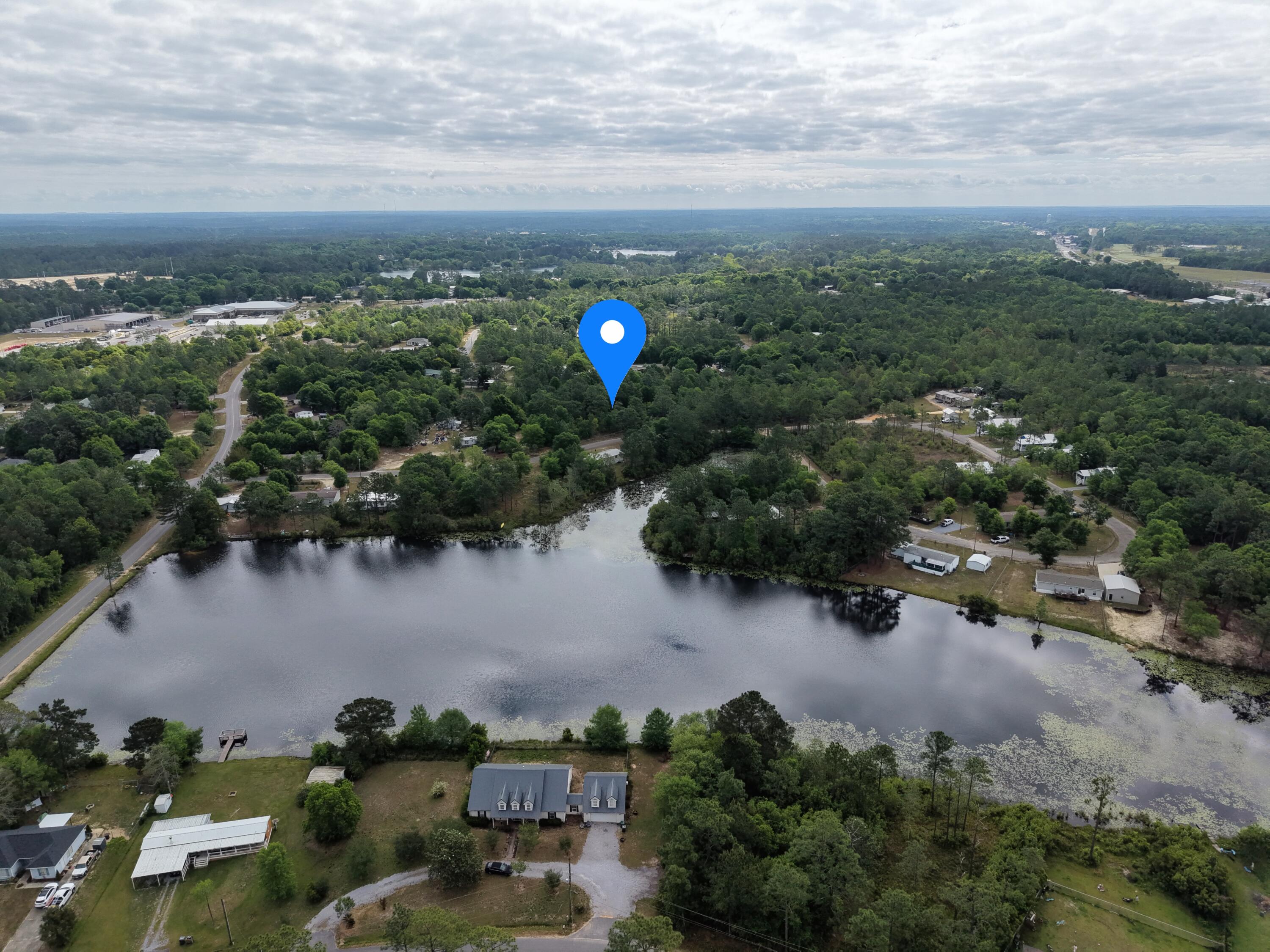 Steps from King's Lake - Build-Ready Lot in Oakwood Lake Estates

This 0.65-acre residential lot is located in Oakwood Lake Estates, just steps from King's Lake. Located in Flood Zone X with no wetlands reported, the property sits within an established residential area that maintains a steady everyday community presence despite the more rural appearance seen from aerial views.

Located within Urban Residential zoning, the property allows for a site-built home, manufactured home, or tiny home, offering flexibility for a variety of future plans. City water is available, and electric poles are already located at the street, helping simplify the building process.

Whether you're looking to build now, invest for the future, or secure land near the lake area, this property offers a practical opportunity with multiple potential uses.

Seller will remove the existing uninhabitable mobile home located at the rear of the property prior to closing. It is partially cleared and wooded, offering a balance of privacy and usable space for building. Enjoy close proximity to multiple lakes throughout Oakwood Lake Estates, with fishing and outdoor access just a short walk away. 

Located in a residential area with a mix of newer brick homes and manufactured homes, this lot offers a practical option for buyers looking to build, invest, or place a home in an established neighborhood.