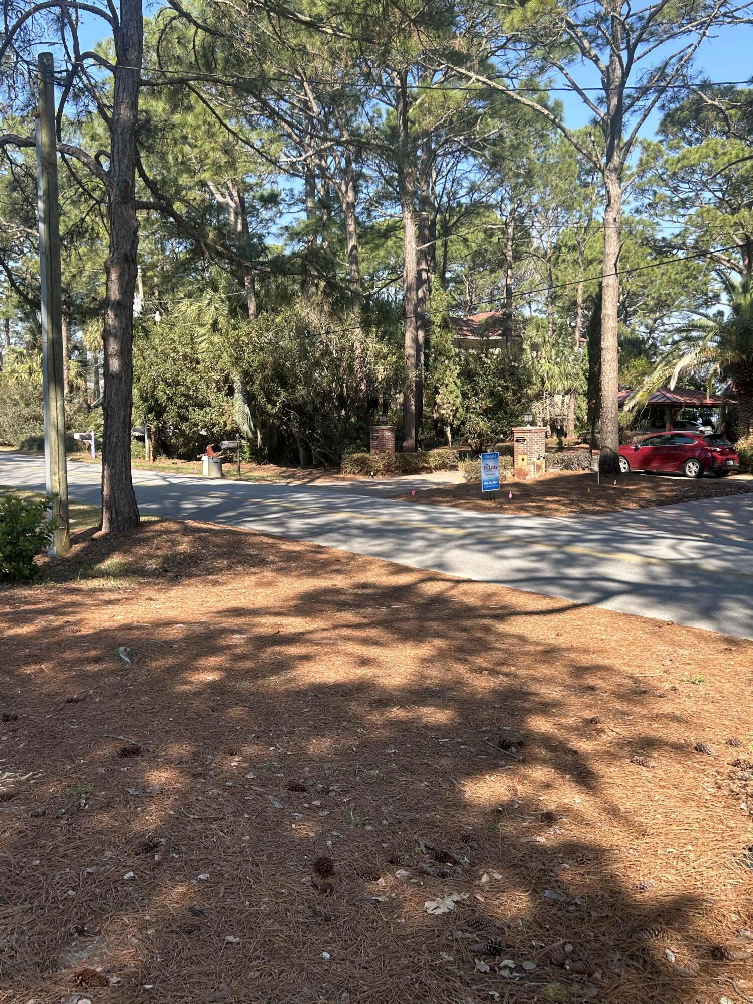 This property presents an exceptional opportunity to construct a custom residence in the tranquil setting of Miramar Beach. The parcel is prepared for development, offering direct bay views and convenient access to the beach by golf cart. The surrounding neighborhoods are well-suited for families as well as retirees seeking a peaceful environment. Each home in the area is uniquely designed, contributing to sustained property value growth. Additionally, the property is located just minutes from the newly renovated Legion Park, which features modern pickleball courts and other amenities. There is no HOA.