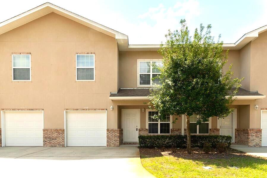 Right outside the back gate of Hurlburt Field and convenient to Eglin AFB as well! This stunning 3-bedroom townhouse offers an expansive 1882 sq ft of beautifully designed living space, perfect for those seeking comfort and style. With two full baths and an additional half bath, convenience is at your fingertips, ensuring ample space for family and guests. The location of this home places you within reach of the best that Fort Walton Beach has to offer, from vibrant attractions to serene beaches. Designed for modern living, this townhouse invites you to experience a lifestyle of ease and enjoyment. Embrace the charm and comfort of 1469 Bentley Circle, where every day feels like a getaway. With an approved pet application, owner will allow pets fully grown 25 lbs or less with a $350 non-refundable pet fee for each pet. All Coastal Realty Services residents are enrolled in the Resident Benefits Package (RBP) which includes renters insurance, HVAC air filter delivery (for applicable properties) and our best-in-class resident rewards program, and much more! All Coastal Realty Services residents are enrolled in the Resident Benefits Package (RBP) which includes renters insurance, HVAC air filter delivery (for applicable properties) and our best-in-class resident rewards program, and much more!