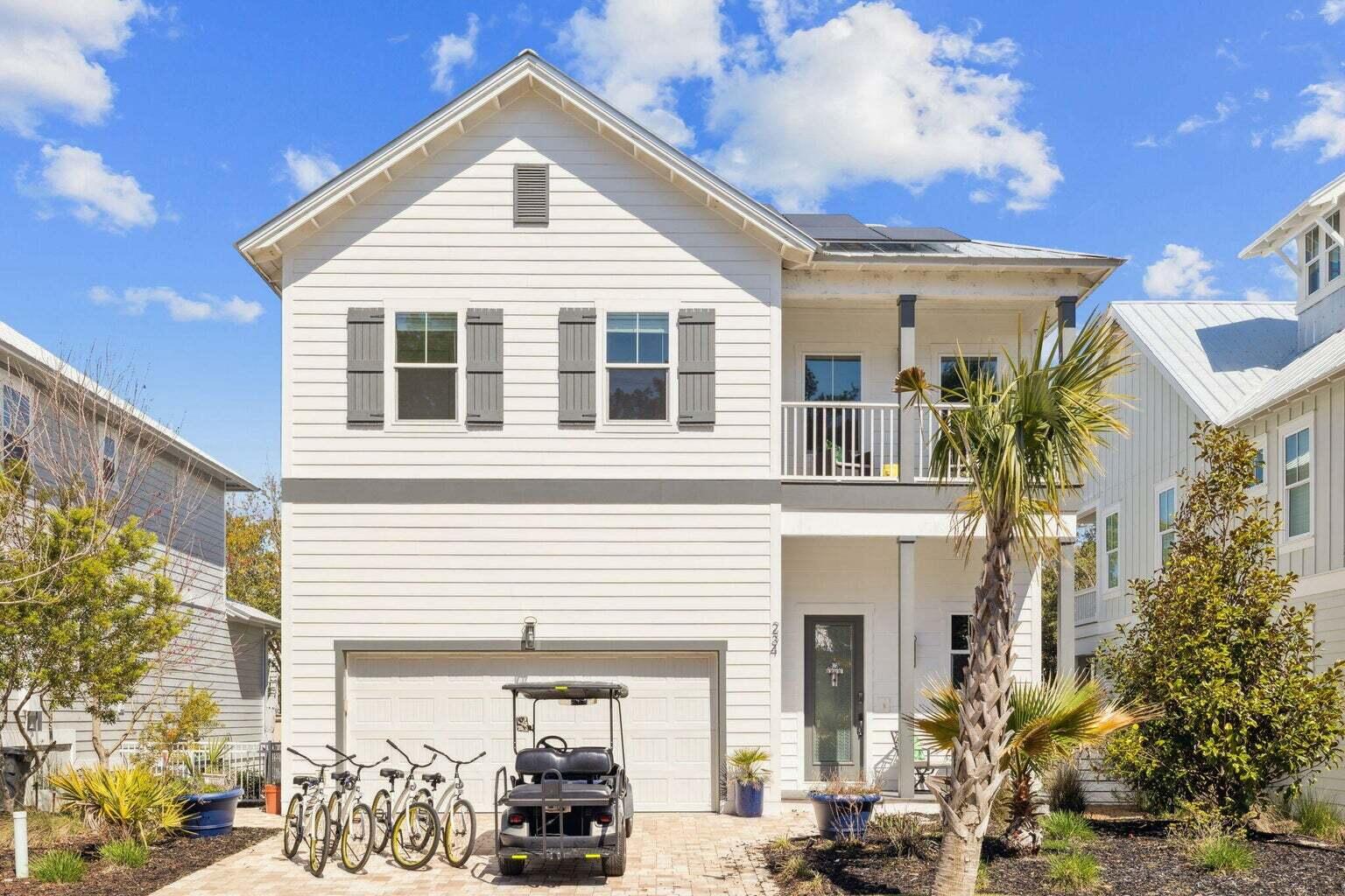 Situated in the highly desirable Grande Pointe community of Inlet Beach, this t 5-bedroom, 3.5-bath coastal home offers an exceptional blend of comfort, efficiency, and privacy. Ideal as a primary residence, second home, or vacation rental.
Thoughtfully designed with quality craftsmanship and modern efficiencies, the home features solar panels connected to the FPL grid that are fully paid off, delivering impressively low monthly power cost.   The home features raised ceilings, rich wood flooring, shiplap accents, and a bright open-concept layout throughout.
The oversized upstairs great room provides an inviting space for gathering and entertaining, while the gourmet kitchen is equipped with a gas cooktop and built-in wall oven, offering both functionality and style. 
Privacy is a standout feature, as the property backs to the rear entrance of the neighborhood with minimal traffic and a decorative concrete wall border, rather than another home's backyard. The surrounding neighbors on both sides are quiet, full-time residents, and the community maintains a low short-term rental presence, creating a peaceful, friendly atmosphere.
Residents enjoy access to a resort-style community pool and clubhouse located directly on Lake Powell, complete with a private dock, further enhancing the coastal lifestyle this neighborhood offers.
With its rare combination of energy efficiency, privacy and community amenities, this Grande Pointe residence presents a compelling opportunity in one of Inlet Beach's most desirable neighborhoods.