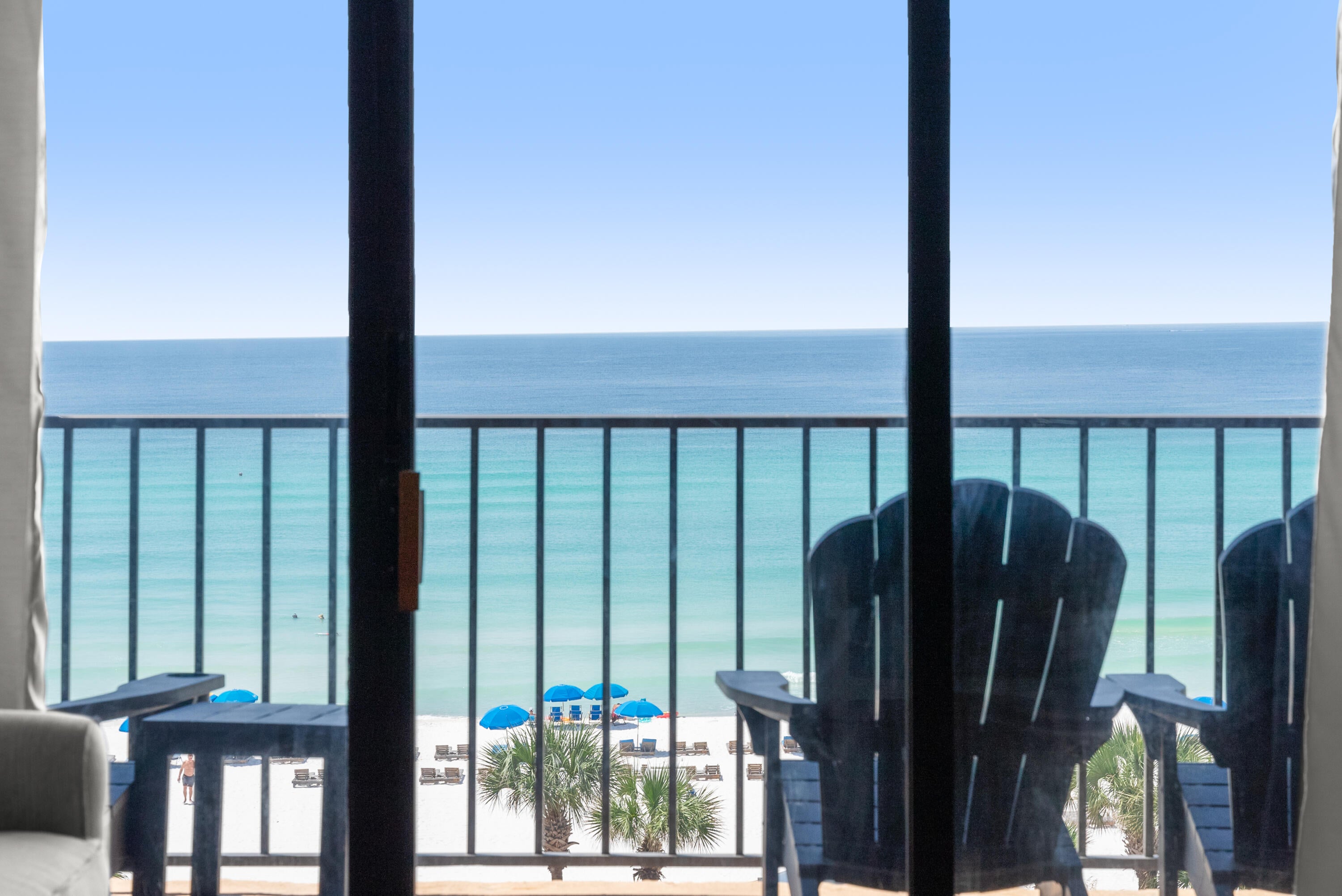 This gulf-front condo was fully renovated in 2025! It provides a highly-desired, modern, coastal design with a turnkey, vacation rental, 2 bedroom, 2 bath unit at Summerhouse, a favorite of owners and guests alike. With over $75,000 in renovations, this unit has remarkable upgrades with 20-mil LVP flooring throughout, beautiful tiled showers, marble countertops, new lighting, vanities, water heater and new roof HVAC system. Pair that with new modern, coastal furnishings and you'll see why this gulf-front condo unit rents so well on the desired on the east end of Panama City Beach. This unit is spacious at just under 1,100 square feet, has a beachfront primary suite and offers breathtaking direct Gulf views from your balcony, the pools and the most perfect sunsets. As you enter the unit, you're greeted with a light, bright corridor with wainscoting-clad walls and LVP that flows seamlessly through the unit. Both bathrooms have been completely modernized with stunning vertical tile in green hues that mirror the turquoise waters of the Gulf of America. Ample storage in new vanities and lighting make for a picture-perfect coastal design. The gulf-front primary suite offers incredible views and you'll wake up to the waves every morning from your bed. The guest suite offers multiple bedding options to maximize your rental, as well. The kitchen features a breakfast bar, marble countertops, stainless appliances and white cabinetry. You'll enjoy ample seating with a modern dining set and 4 counter stools at the breakfast bar. Thoughtfully designed with shiplap-clad walls, fun wooden surfboard decor and plenty of seating in the neutral, yet modern, coastal living room. Step out of the living room onto the spacious patio and let the indoor-outdoor experience of Florida we all love soak in. The primary suite offers a king bed where you'll actually get to relax at the beach. In-unit laundry is also a great convenience at the beach. Summerhouse is a top-rated, gulf-front resort in Panama City Beach and guests come back year after year because of the amenities. Summerhouse offers two beachfront pools, including one heated seasonally, a kiddie pool area, hot tub, tennis courts, pickle ball courts, game room with billiards and arcade, owners lounge, gazebo by the beachfront pool and plenty of parking. Step out of your unit and enjoy coffee and the seabreezes in the mornings then head to the beach for a day by the turquoise waters and sugar white sands. Summerhouse is positioned just right on the east end of the beach on Thomas Drive, just minutes from St. Andrews State Park, multiple marinas including dry boat storage, many waterfront dining establishments, local fishing charters, pontoon boat rentals, and shopping. If you're looking for a turn-key, short-term vacation rental and maximizing your income, this is the unit for you! No deferred maintenance, just income in your pocket. Not looking to rent? Owners love Summerhouse, as well, and there are many owners that utilize their condos as second homes and places for their families to getaway to the beach.