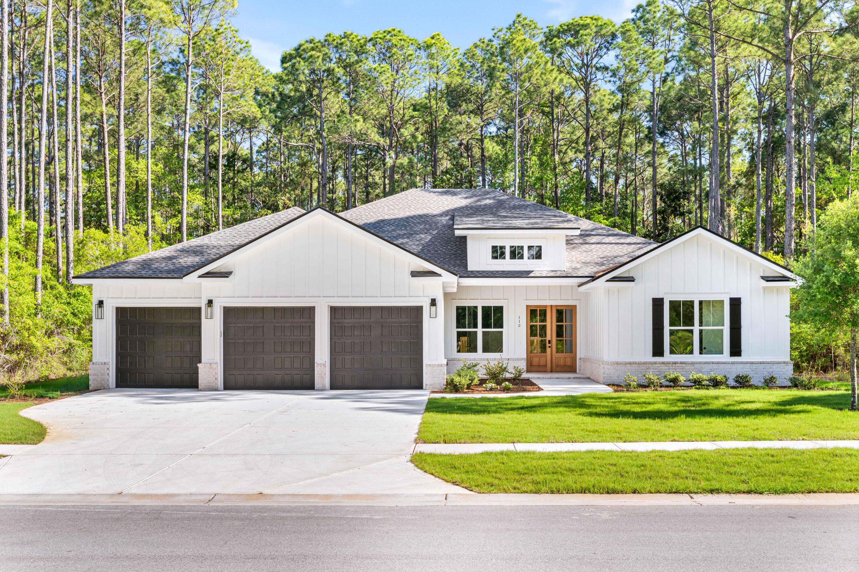 Seller offering $15,000 incentive towards closing cost or rate buy down! Discover modern luxury in this custom-built, new construction home tucked within the natural beauty of Steamboat Landing in Hammock Bay. Backing up to a wooded preserve and surrounded by lush landscaping, this expansive ranch-style retreat offers year-round privacy and relaxation, boasting 4,510 sqft of entertainment space with 3,363 sqft of heated/cooled living space. Blending modern convenience and timeless elegance, this 4 bedroom with a bonus room/office, 4 bath, and 3-car garage home has it all; warm champagne/bronze finishes, expert craftsmanship, detailed trim work and thoughtful design touches. Don't miss your chance to own one of the most exquisite new builds in this gated bayfront community- schedule your private tour today Featuring a gas indoor and outdoor ventless fireplace, 10ft ceilings, custom mahogany front doors, large 8x14ft glass sliding doors opening to the back patio, vast primary suite, oversize 7" cove crown molding, and a custom kitchen with a walk-in pantry, spacious island, quartz countertops, double ovens, upgraded appliances (48" wide range tope and fridge). 

Set within the master-planned community of Hammock Bay, Steamboat Landing is an exclusive enclave offering a rare waterfront lifestyle on Choctawhatchee Bay. This private, gated neighborhood features expansive homesites with luxury residences that showcase a refined coastal aesthetic and generous outdoor living spaces. Residents enjoy direct access to the bay via a scenic 500-foot pier, ideal for sunset views or launching a paddleboard. A short walk away, the new Bay Club serves as a vibrant gathering spot offering over 8,000 square feet of elevated design with wraparound porches, a cozy lounge, high-speed WiFi, and panoramic water views. Surrounded by preserved natural beauty and connected by trails, Steamboat Landing seamlessly blends serenity, luxury, and bayfront living.