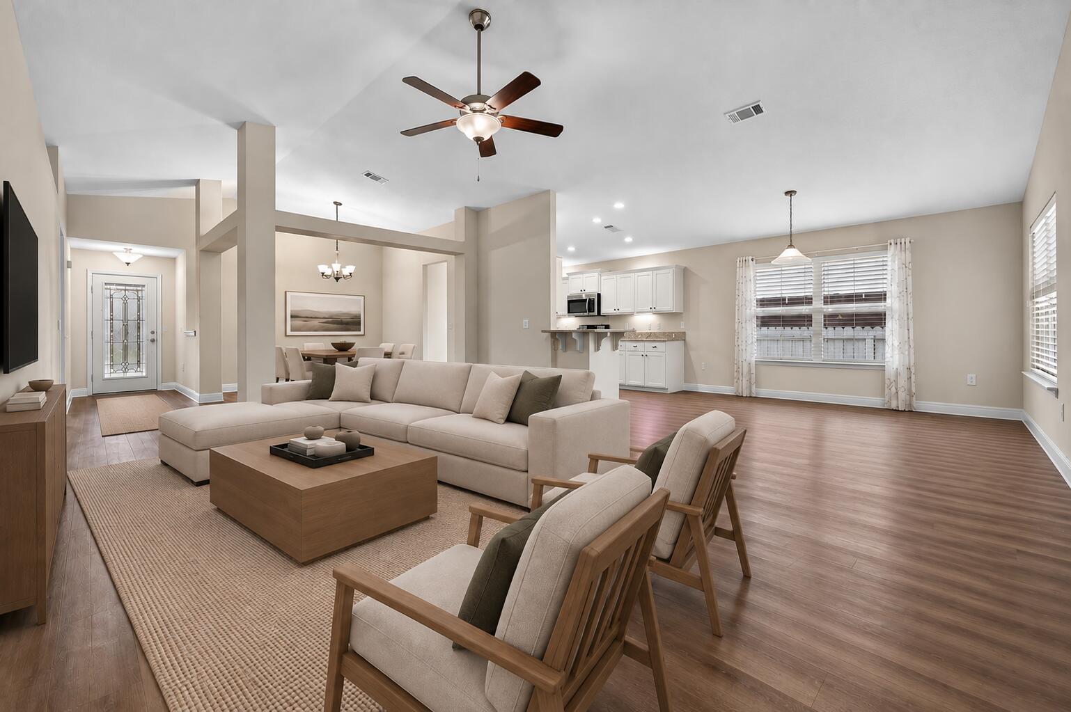 Built in 2018 and situated on a generous one-third acre lot, this move-in-ready home offers a spacious backyard, thoughtfully designed interior, and a great location in a peaceful, quiet neighborhood with no HOA! Positioned just off Highway 98, the home is near Navarre Beach and Pensacola Beach, with convenient access to shopping and schools, and next door to the Gulf Breeze Zoo. The fully fenced backyard has a private, secret-garden feel, blending open green space with a wooded backdrop, complemented by recently refreshed landscaping. Two winding walking paths invite you to explore, while a 7x7 storage shed, irrigation well, sprinkler system, and generous yard space provide plenty of possibilities for gardening, pets, a fire pit, or outdoor gatherings. Inside, the open floor plan features vaulted ceilings, wood-look flooring throughout the main living areas, and a neutral color palette. The kitchen offers beadboard cabinetry, striking granite countertops, stainless steel appliances, and an adjacent laundry room with extra pantry storage. A breakfast nook provides casual dining space, while the formal dining room offers additional space for entertaining. Just off the living room, the covered patio features a retractable sunshade for added privacy and comfort. The split-bedroom layout provides added privacy for the spacious primary suite, featuring a tray ceiling, patio access, and an ensuite with granite-topped double vanities, a garden tub, separate shower, private water clo et, and large walk-in closet. Two additional bedrooms share a full bathroom and offer carpet, ceiling fans, and spacious closets. The home also includes fabric hurricane shutters. With a flexible layout, spacious lot, peaceful setting, and convenient location near beaches, schools, and everyday necessities, this home is ready for comfortable Florida living!