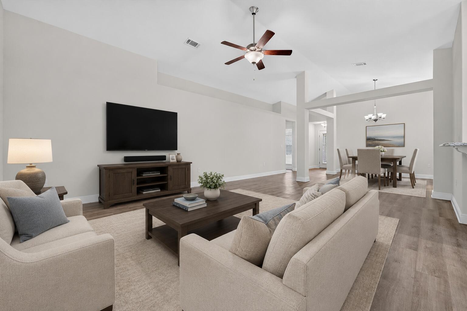 Built in 2018 and situated on a generous one-third acre lot, this move-in ready home offers a spacious backyard and a thoughtfully designed interior. The fully fenced backyard has a private, secret garden feel, blending open green space with a wooded backdrop. Two winding walking paths invite you to explore, while a 7x7 storage shed, generous yard space, irrigation well, sprinkler system, and natural surroundings provide endless possibilities for a fire pit, gardening, pets, or outdoor gatherings. This home sits in a neighborhood with no HOA and a great location being positioned just off Highway 98, 15 min to Navarre Beach and next door to the Gulf Breeze Zoo and the brand-new Soundside High School. Inside, the home features an open floor plan with vaulted ceilings, wood-look flooring throughout the main living areas, and a neutral color palette that complements any style. The kitchen features aesthetic beadboard cabinetry, striking granite countertops, stainless steel appliances, and an adjacent laundry room with additional pantry storage. A breakfast nook provides an area for casual dining, while the formal dining room offers additional space for entertaining. Just off the living room, the covered patio extends your living space outdoors and includes a retractable sunshade for added privacy and comfort. The split-bedroom layout provides privacy for the spacious primary suite, featuring a tray ceiling, direct access to the covered patio, and an ensuite bathroom with all you could want: granite-topped double vanities, a garden tub, separate shower, private water closet, and a large walk-in closet! Two additional bedrooms are located on the opposite side of the home, each offering cozy carpet, ceiling fans, spacious closets, and access to a shared full bathroom. The home also has fabric hurricane shutters. Offering a flexible layout, spacious lot, and convenient location, this home is well suited for both comfortable everyday living and entertaining!