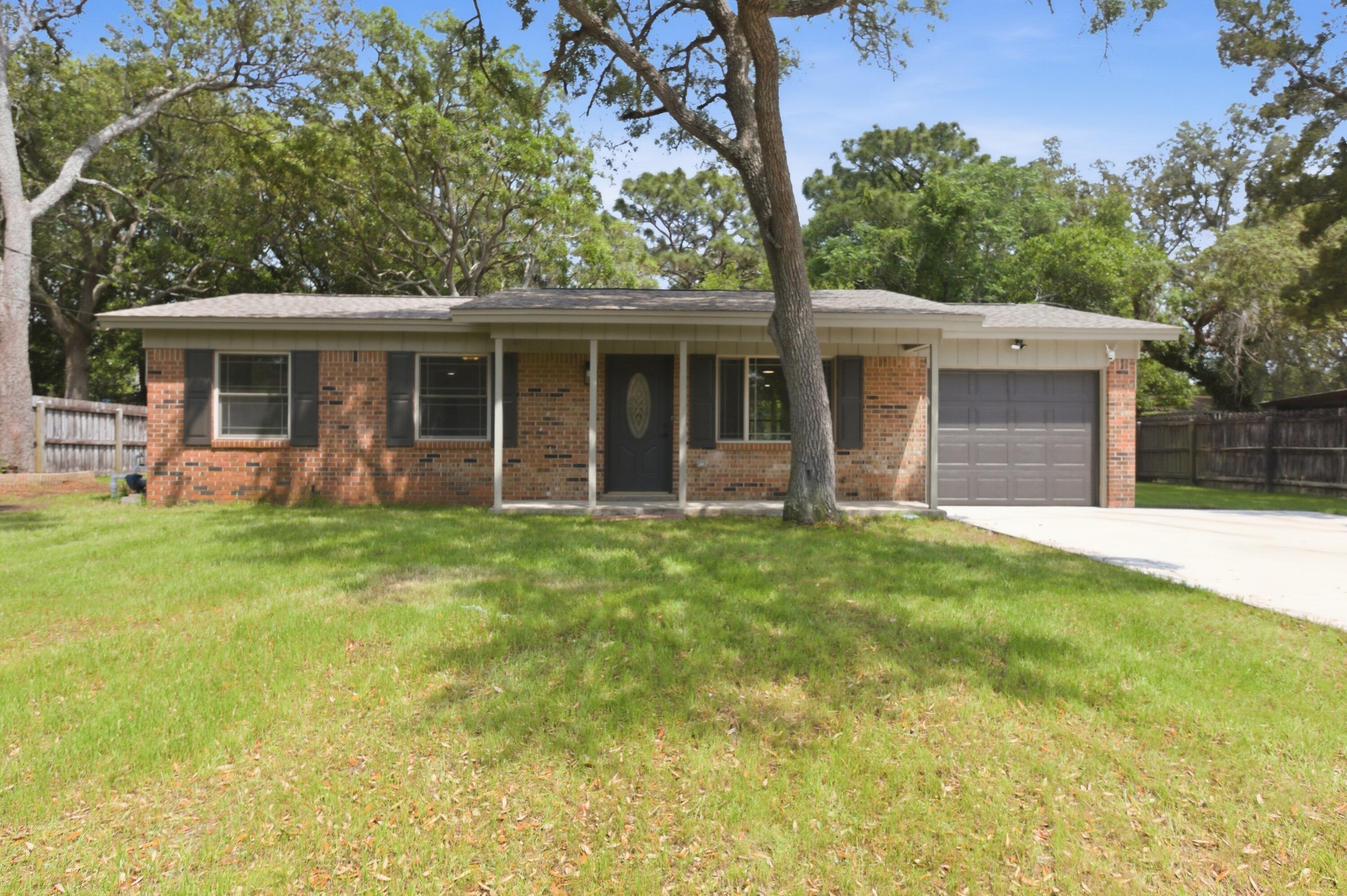 Welcome to your new home! This beautifully remodeled brick home is located right in the heart of Shalimar. NO HOA. 6 miles from Eglin AFB and 9 miles from Hurlburt Field. The nearest beach is only 5 miles away! NEW ROOF 2026 - New LVP flooring throughout - NEW AC - New light fixtures - Hall bath remodel -NEW COPPER WIRING THROUGHOUT - New deck - New fireplace - NEW oversized driveway - New appliances - NEW GRANITE - Lawn system updated and replaced (on well with timer)- New hot water heater - Insurance dreams! Don't miss out - schedule a showing TODAY