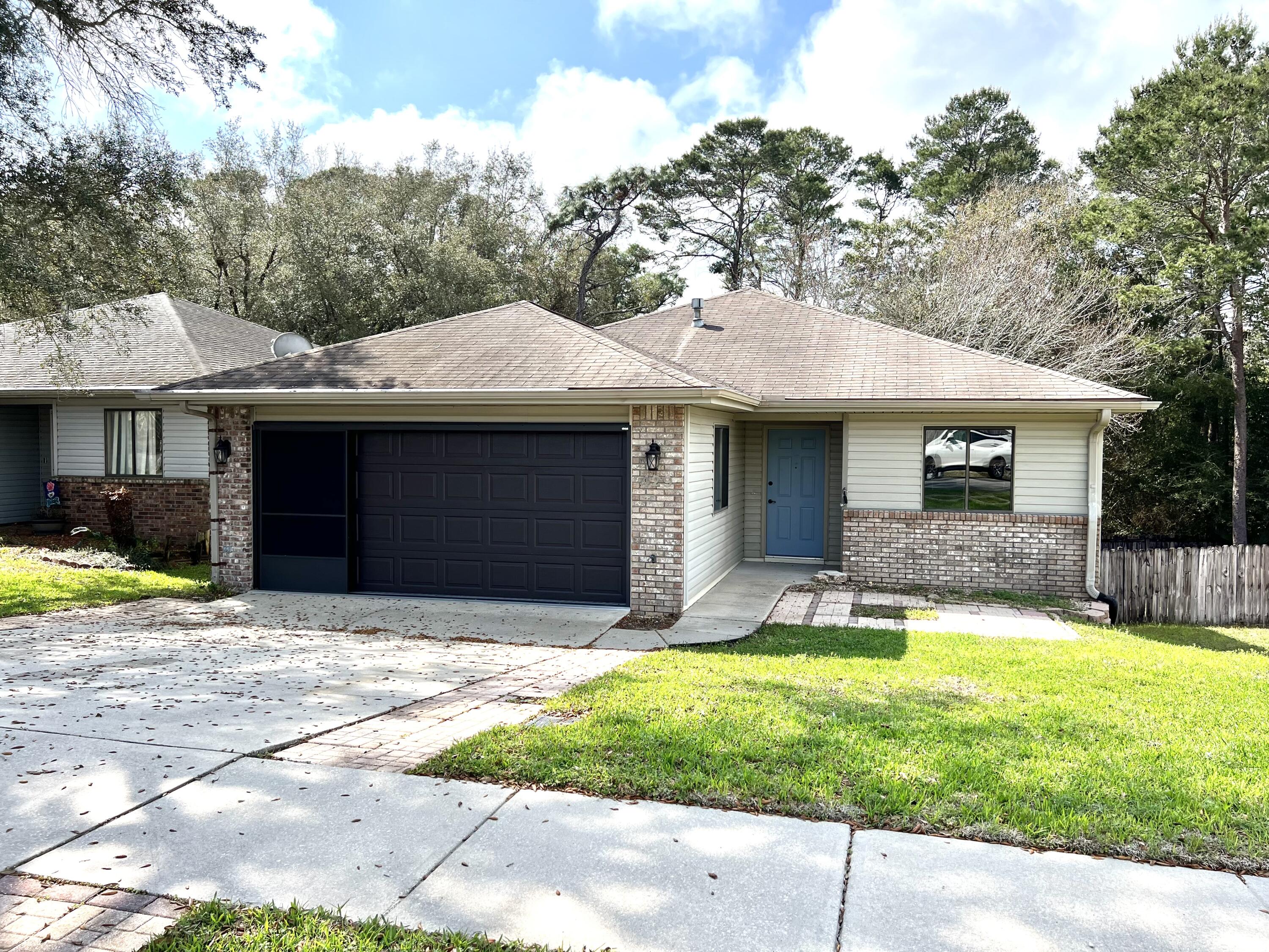 Welcome to this beautifully updated 2-bedroom, 2-bathroom home nestled in the heart of Niceville! From the inviting covered front entry to the thoughtfully designed interior, this home offers the perfect blend of comfort and modern style. Step inside to discover soaring vaulted ceilings and luxury vinyl plank flooring that create a bright, open living space. The fully renovated kitchen is the centerpiece of the home, featuring a butcher block peninsula overlooking the living room, stainless steel appliances, a gas range, stylish tile backsplash, and ample cabinet space--ideal for both everyday living and entertaining.

The spacious primary suite includes a walk-in closet and an en-suite bathroom with a shower/tub combination, a beautiful slate blue vanity, and a convenient linen cabinet for additional storage. The guest bedroom is filled with natural light and includes a ceiling fan for added comfort. Enjoy Florida living year-round from the expansive screened-in deck complete with a ceiling fan, or gather around the built-in fire pit in the large, fully fenced backyard.

Conveniently located just minutes from top-rated schools, shopping, dining, parks, and local military bases, this home offers the ideal combination of location, style, and functionality. Schedule your showing today!
