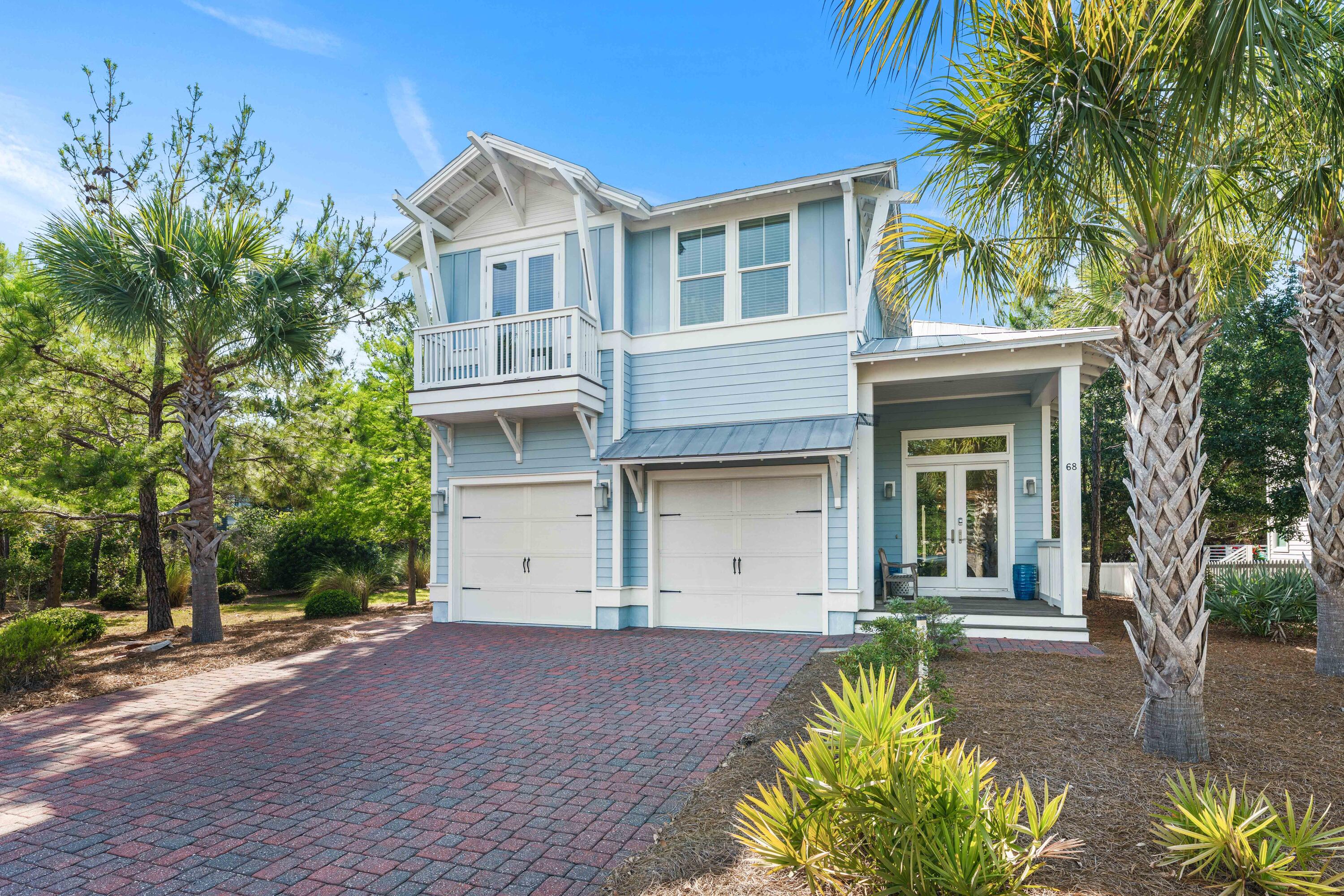Stunning coastal luxury residence professionally decorated sold fully furnished with 4-bedroom, 4-bath with over 3,100 square feet, built in 2017, extra-large private driveway and a 2-car garage. Perfect for investors seeking high returns, on a spacious private fully furnished home. Loaded with upgrades soaring ceilings, hardwood floors, custom cabinets, 10-ft ceilings, 8-ft doors, crown molding, hurricane impact doors and windows. Large center island, stainless appliances, gas cooktop, custom backsplash, large pantry. Spacious second floor master bedroom with spa-like suite. Three guest bedrooms & two full baths with tiled showers on the second level.  Fantastic location in Prominence on the desirable South side. With a highly coveted location on 30A's East end.