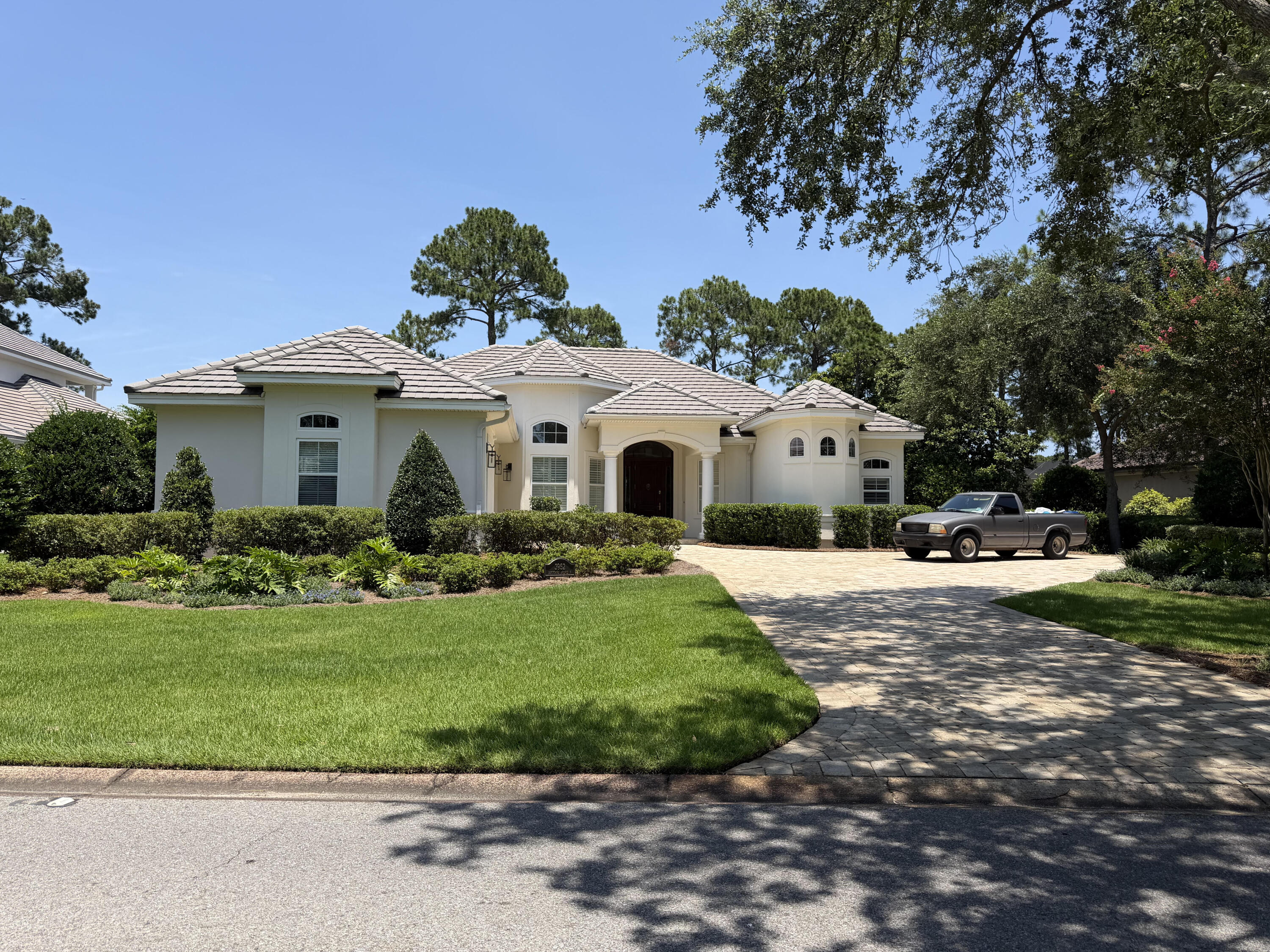Lovely single level home with golf course views and enclosed pool.