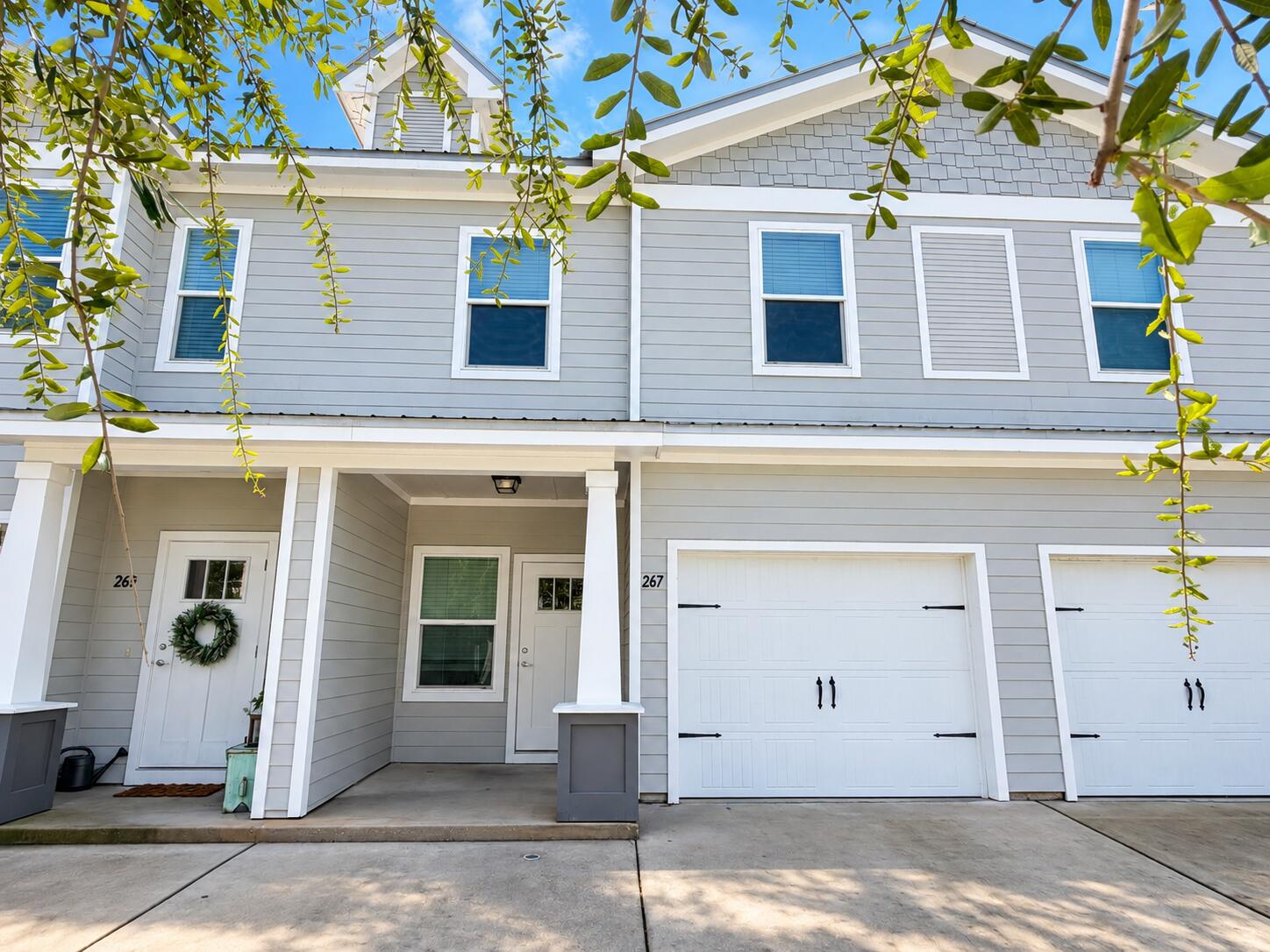 Enjoy upgraded, low-maintenance living in this beautifully maintained 3-bedroom, 2.5-bathroom townhome featuring a one-car garage and access to a community swimming pool. Conveniently located directly across from an elementary school, just minutes from a Publix shopping center, and a short drive to the sugar-white sand beaches and emerald waters of 30A/South Walton, this home offers both comfort and convenience.

The main level features a bright open floor plan with fresh neutral paint and durable flooring throughout, with no carpet. The spacious living room flows into the dining area and a well-appointed eat-in kitchen complete with a breakfast bar, quartz countertops, stainless steel appliances, including a smooth-top range, a stylish tile backsplash, pantry, and ample cabinet and counter space. A convenient half bathroom with a pedestal sink and a screened-in back porch overlooking a peaceful green space complete the first floor.

Upstairs, the spacious primary suite offers a walk-in closet and a private en suite bathroom featuring a double vanity, quartz countertops, and a walk-in shower. Two additional guest bedrooms, one with its own walk-in closet, share a full bathroom. Laundry hookups are conveniently located upstairs, and the home also offers multiple storage closets along with attic storage.

Rent includes lawn care, pool maintenance, and garbage service, making it easy to enjoy a hassle-free lifestyle.  Pets may be considered on a case-by-case basis with prior owner approval and a non-refundable pet fee. Smoking and vaping are not permitted.
