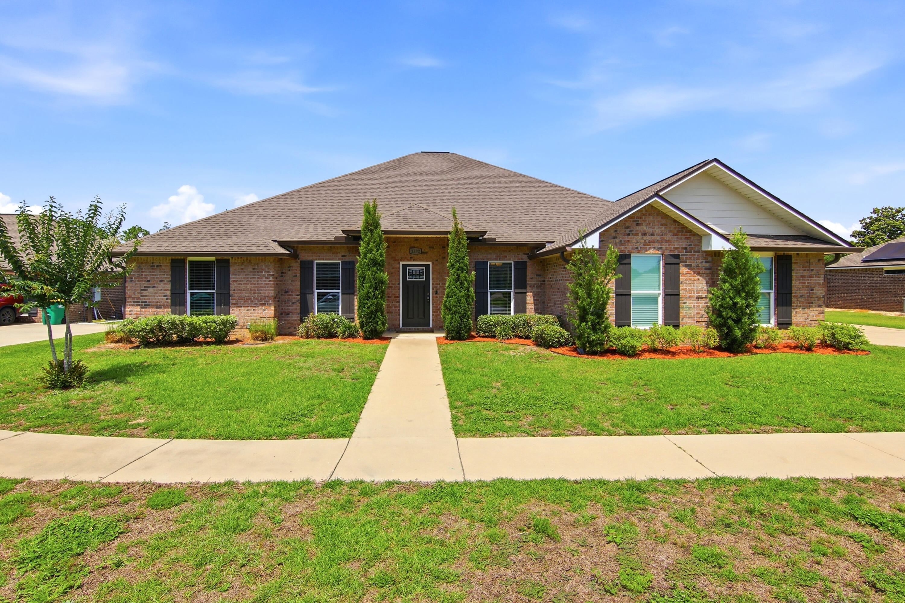 Welcome to 2892 Chancery Lane, a well-maintained home located within the gated community of Chanan Estates in Crestview. Positioned at the very beginning of South Crestview, the home offers a convenient location with easy access to 7th Group, Duke Field, and Eglin Air Force Base, as well as nearby shopping, schools, and the interstate for an efficient commute in any direction. A rare opportunity for eligible buyers to assume the seller's 2.6% VA loan (VA to VA only) makes this home an exceptional value and could provide substantial monthly savings compared to current market interest rates. Chanan Estates is a quiet, established neighborhood known for its consistent upkeep and sense of stability. The community reflects pride of ownership throughout, with a setting that feels residential and grounded rather than busy or congested.

Inside, the home offers 3,052 square feet of living space with a layout that is both practical and open. The design provides multiple living areas and well-sized rooms that support everyday living, gatherings, and flexibility for a variety of needs. The flow of the home feels natural and functional, without wasted space.

The property has been well cared for and maintained, allowing a new owner to move in without immediate projects or updates.

With its gated setting, low HOA, and central South Crestview location, this home offers a balance of privacy, convenience, and value that is increasingly hard to find. It's a straightforward, solid property in a location that continues to be in demand.