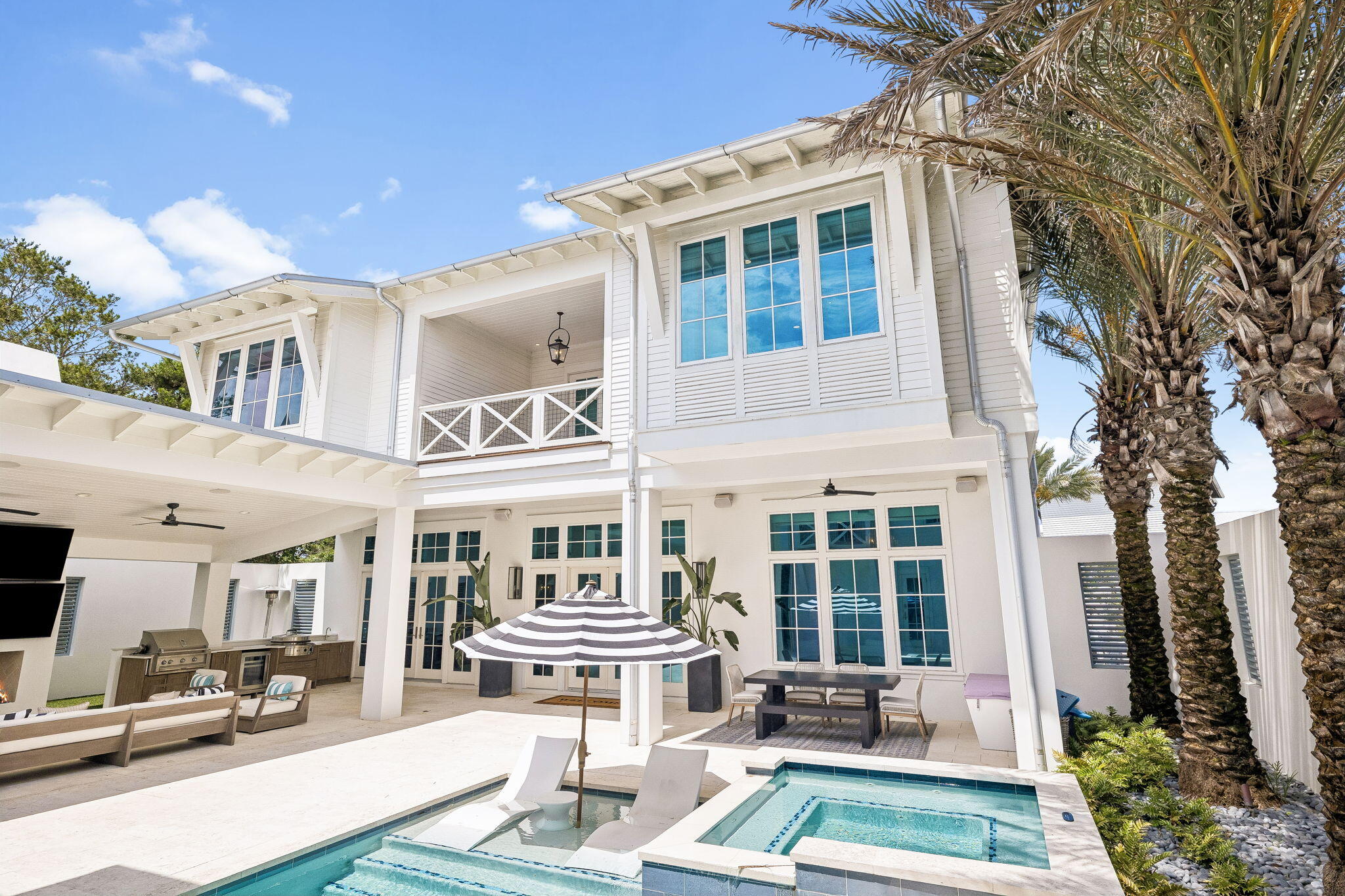 Steps from the emerald waters of the Gulf and its iconic sugar-white sand, this coastal villa offers a timeless approach to sophisticated beach living. Tucked away along one of Inlet Beach's most desirable streets, 65 A Street enjoys a rare sense of privacy while remaining a bike ride or walk from the iconic 30A communities of Alys and Rosemary Beach, as well as the  Watersound Beach Club and Camp Creek Inn.
Thoughtfully designed for effortless entertaining and everyday coastal living, the home is centered around a private resort-style courtyard where indoor and outdoor spaces come together seamlessly. Multiple gathering areas, a true gourmet outdoor kitchen, and beautifully designed living spaces create an atmosphere that is both inviting and refined. Inside, an open floor plan features a first-floor primary suite, dedicated fitness room, theatre, bunk room, and eight spacious bedroom suites, each with its own private en-suite bath. With views from the rooftop terrace offering Gulf views and the perfect place to take in the Sunset.
Purposefully crafted with timeless architecture, luxury finishes, exceptional craftsmanship, and an emphasis on sophisticated comfort, privacy, and effortless living, 65 A Street is a distinctive coastal retreat designed to be enjoyed for generations. Buyer to verify all dimensions.