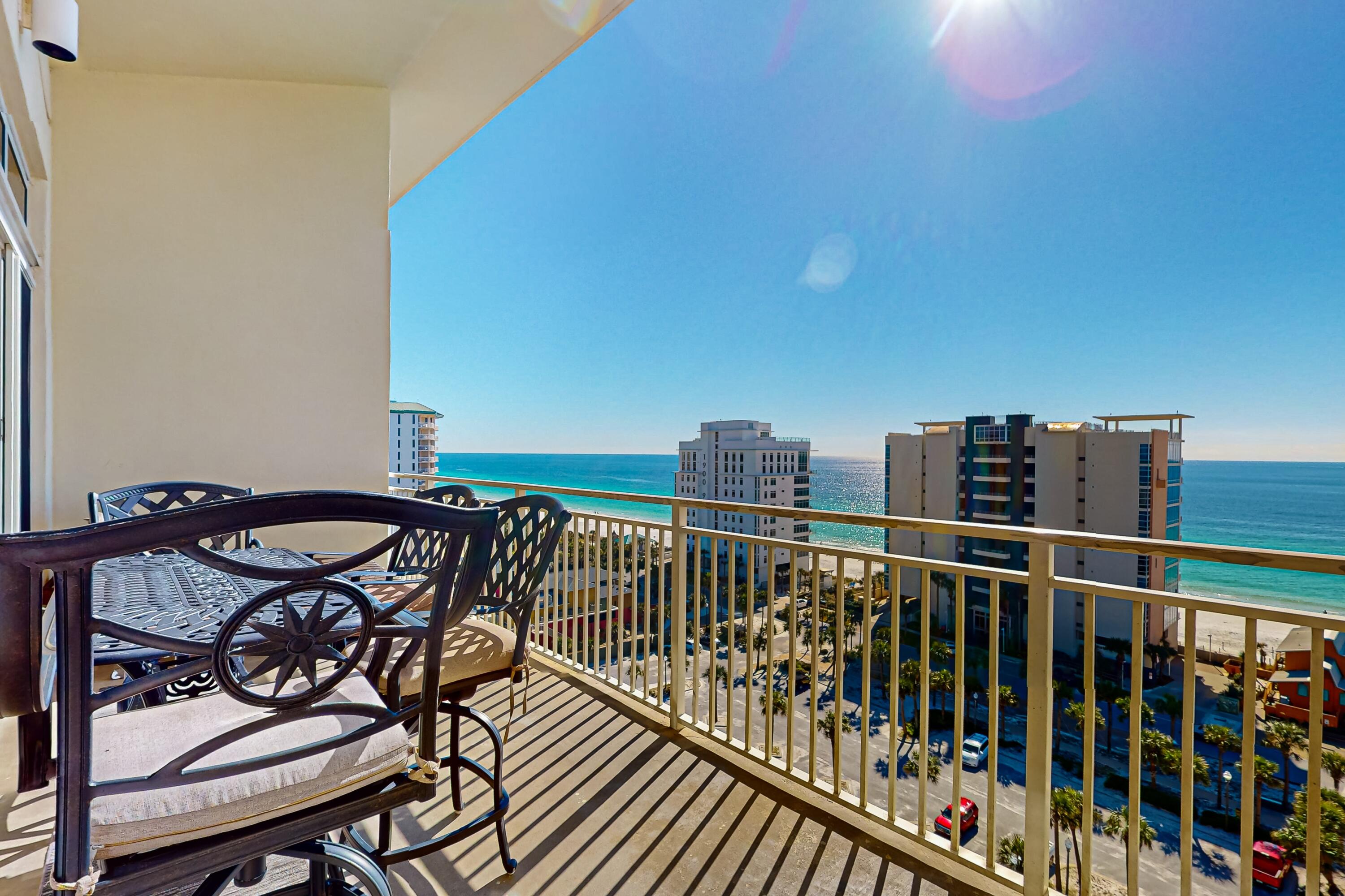 Penthouse residence with soaring 11-foot ceilings and expansive views. Kitchen is equipped with full appliances and ample cabinet storage. Primary suite features its own private bath; additional bedrooms are well sized and offer comfort and convenience. Residents enjoy resort-style amenities including lagoon-style pool, Gulf-facing pool, fitness center, theater room, gated entry, and deeded beach access. HOA maintains all exterior, common grounds, security, and landscaping. Rare opportunity to own a beachside penthouse