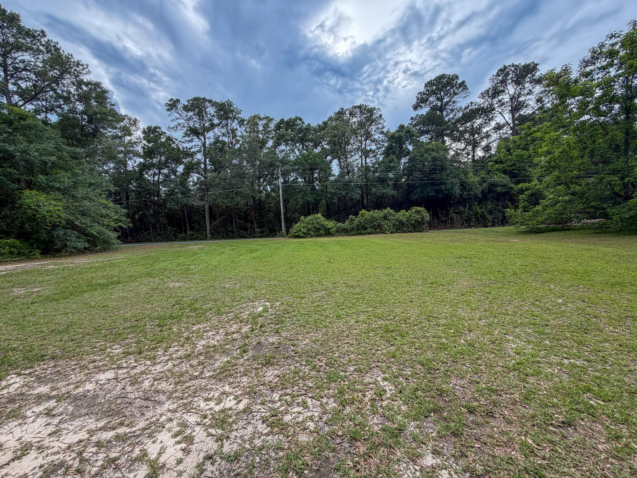 Prime Baker vacant lot with approximately 160 feet of frontage on Old River Road. Excellent opportunity to build your dream home in a desirable rural setting with convenient access to Baker and Crestview. Plenty of space and possibilities in a sought-after location.

Seller to verify lot dimensions.