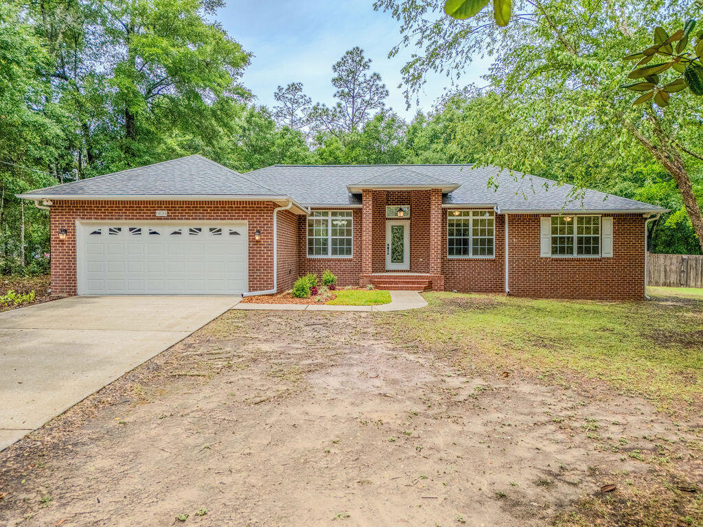 Welcome to 6634 Yellow Hill Drive -- a fully renovated, move-in ready home offering 3 bedrooms, 2 bathrooms, plus an office/flex space across 1,848 square feet. Built in 2007, this home features a desirable split floor plan with thoughtful updates throughout.

Recent improvements include fresh interior paint, brand new flooring, updated plumbing and lighting fixtures, a timeless kitchen backsplash, stainless steel appliances, and a 2026 hot water heater. The kitchen and bathrooms feature granite countertops, while the living spaces offer durable LVP flooring with tile in all wet areas. There is no carpet in the home. The HVAC system was replaced in 2020 for added peace of mind & has been recently serviced & well maintained (May 2026).

Situated on a spacious .34-acre lot, this property offers privacy with neighbors not in close proximity, along with mature trees that create a peaceful setting in both the front and back yard. Step outside to enjoy the backyard deck directly off the rear entrance, a new double gate for easy access, and a 6x12 storage shed complete with a loft for additional storage space.

Just minutes away from the heart of Milton & 10 minutes from Pace. Located in flood zone X with no HOA, this property combines comfort, functionality, and freedom -- all while being completely move-in ready.