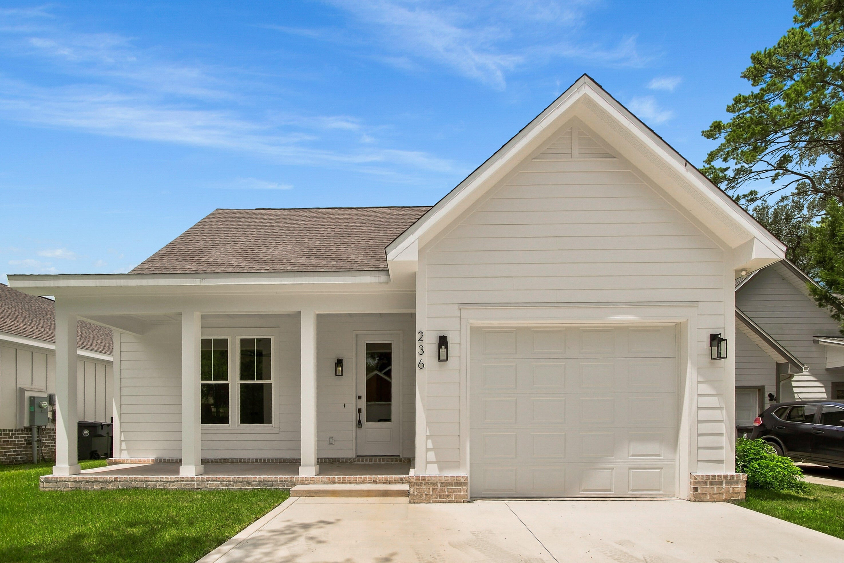 Experience 30A-inspired style without the 30A price tag at 236 N Marsh Landing in LaGrange Landing. Ideally positioned near Highway 331, this custom-built, new-construction home offers convenient access to the beaches, dining, and activities along Scenic Highway 30A, as well as Publix and the new Walmart development now underway. As Freeport continues to grow and welcome new businesses, this centrally located community offers an exceptional opportunity to own a high-end home near the area's expanding commercial corridor and the Emerald Coast lifestyle.

Inside, the home features 3 bedrooms, 2.5 bathrooms, 1,958 square feet of refined living space, an open-concept floor plan, and an attached garage. The designer kitchen showcases quartz countertops, a waterfall island, and premium Bosch appliances, combining everyday functionality with polished, coastal-inspired style. Quality upgrades include solid-wood interior doors, 6-inch baseboards, custom closet systems, tile flooring in the bathrooms and laundry room, 2x6 exterior framing, and enhanced roofing underlayment.

Residents can also enjoy the community pool and playground. Thoughtfully crafted with upscale finishes and quality construction, this home delivers the elevated look and feel associated with 30A at a more attainable Freeport price point. The seller is providing a one-year builder warranty and a 10-year structural warranty.
