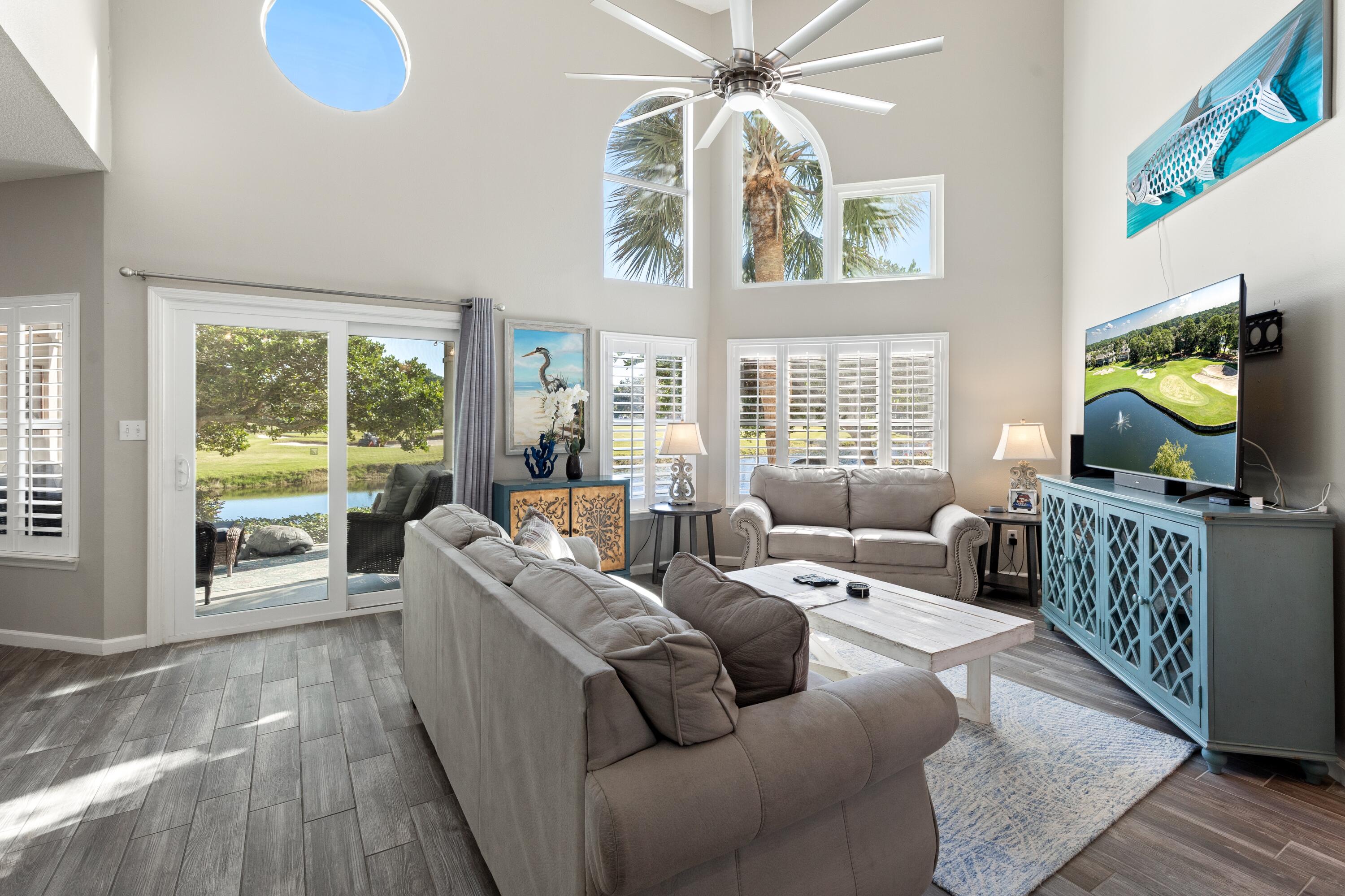 Welcome to 982 Northshore Drive, a beautifully updated townhome located within Sandestin Golf & Beach Resort. This floor plan includes a primary bedroom on the main level as well as an additional primary suite upstairs, offering comfortable accommodations for owners and guests.
The kitchen features new quartz countertops, a stylish backsplash, soft-close cabinetry, a new sink and faucet, and a shiplap accent wall--ideal for everyday living and entertaining. Additional updates include new sliding glass doors, new windows,  plantation shutters, porch flooring, and newly installed patio pavers that enhance the outdoor living space.
The downstairs primary bathroom includes a newly tiled shower, while the upstairs primary bathroom has been updated with a new tile shower and quartz countertops