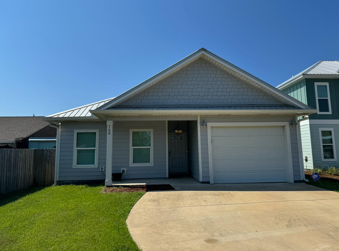 Sandpiper 2.0 model. Located just steps away from Lake Powell and a short walk to the Worlds Most Beautiful Beaches of Panama City Beach & the Beaches of 30A. Osprey Pointe at Powell is a 17 home subdivision in a golf cart friendly community. This model features 3 Bedrooms with the Master Suite to include Large Walk in Closet, His & Her sinks and access from bedroom to Porch. Open Plan Living Area. Kitchen features Stainless Steel Appliances, Granite Counters, Pantry and Kitchen Island, LVP flooring thru out with tiled bathrooms. Enjoy Coastal living and relax in your home.