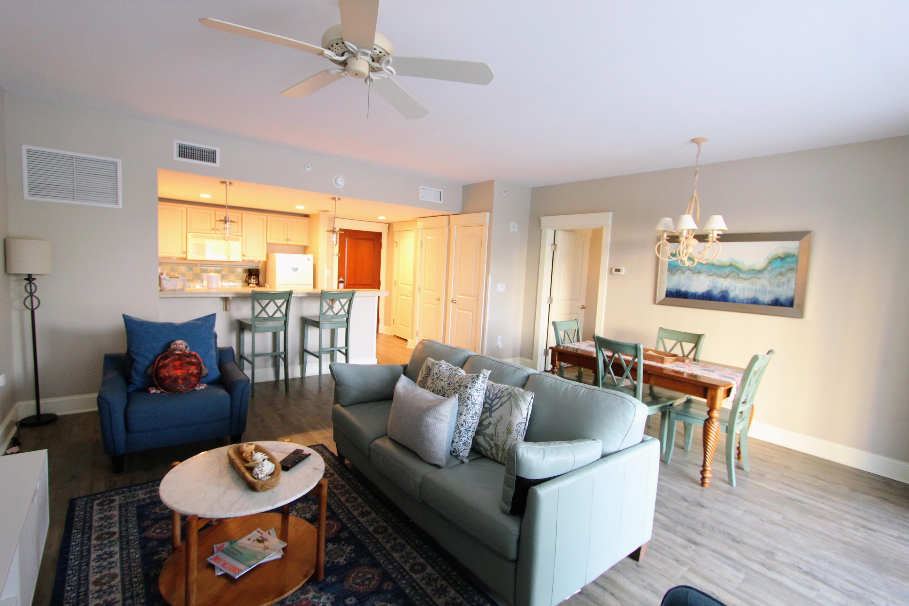 Experience resort living at its finest in this beautifully appointed Grand Sandestin condo featuring the largest floor plan in the building! This spacious residence offers two full bathrooms, an oversized private balcony exclusive to third-floor units, and an open layout designed for comfort and entertaining. Luxury wood-look flooring, neutral finishes, and floor-to-ceiling windows fill the living area with natural light.
The open kitchen features pantry storage, a breakfast bar, and a dining area that seats up to eight. The spacious primary suite includes an ensuite bath with dual vanities and a tub/shower combination, while a queen sleeper sofa and second full bath provide comfortable accommodations for family and guests.
Relax on the expansive balcony, ideal for morning coffee, outdoor dining, or unwinding after a day of enjoying the resort. Two owner's closets and a covered parking space with a private storage cage offer convenient storage for personal belongings, bikes, and beach gear.
Located within Sandestin Golf & Beach Resort, enjoy access to championship golf, tennis, multiple pools, a fitness center, a marina, scenic walking and biking trails, and the Village of Baytowne Wharf with shopping, dining, entertainment, and seasonal events. The sugar-white beaches and emerald waters of the Gulf are just a short trip away, making this an exceptional primary residence, vacation getaway, or investment opportunity.