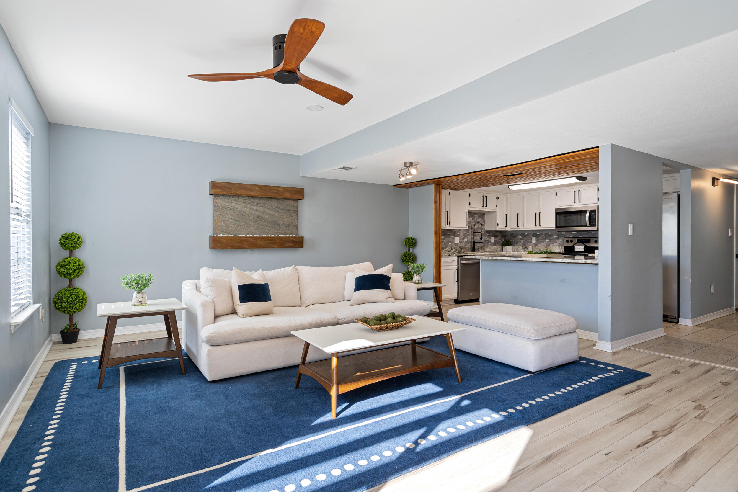 This smart home-activated residence offers seamless control and convenience, while the one-car garage provides secure parking and additional storage. The roof was replaced in 2021, offering peace of mind and long-term value.

Step outside to a private, low-maintenance oasis. The covered back patio with a lighted pergola sets the tone for evening relaxation, while the artificial turf backyard eliminates upkeep without sacrificing aesthetics. A built-in waterfall feature adds a tranquil, resort-style ambiance rarely found in townhome living.

Ideally located near Eglin Air Force Base and Hurlburt Field, with close proximity to top dining, shopping, and entertainment, this home offers both lifestyle and location.

Modern. Stylish. Low maintenance. This is elevated townhome living at its finest.