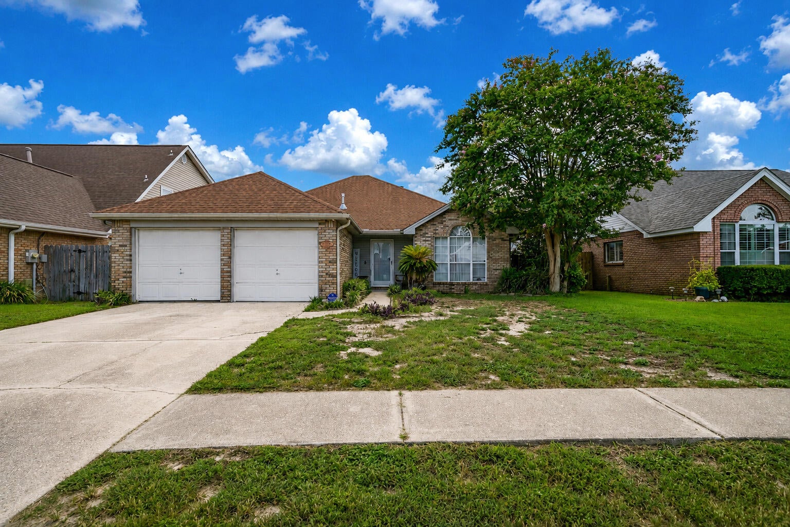 This beautifully maintained brick ranch offers attractive curb appeal with mature landscaping, a private screened porch, and a sparkling pool, all nestled in a peaceful, established neighborhood. The open-concept layout features a spacious kitchen equipped with granite countertops, stainless steel appliances, including a Maytag Gemini double oven, and oversized 20-inch ceramic tile flooring that extends through the kitchen and bathrooms. The inviting living area boasts a soaring vaulted ceiling and a cozy fireplace, creating the perfect gathering space. The generously sized primary suite includes an en-suite bath with a separate walk-in shower and a relaxing jetted soaking tub. Additional highlights include gas pool heater for year-round enjoyment. Ideally situated in the heart of Destin, this home offers convenient access to HarborWalk Village, Destin Commons, multiple beach access points and golf courses, and HWY 98, placing shopping, dining, entertainment, and the Emerald Coast's best attractions just minutes away.