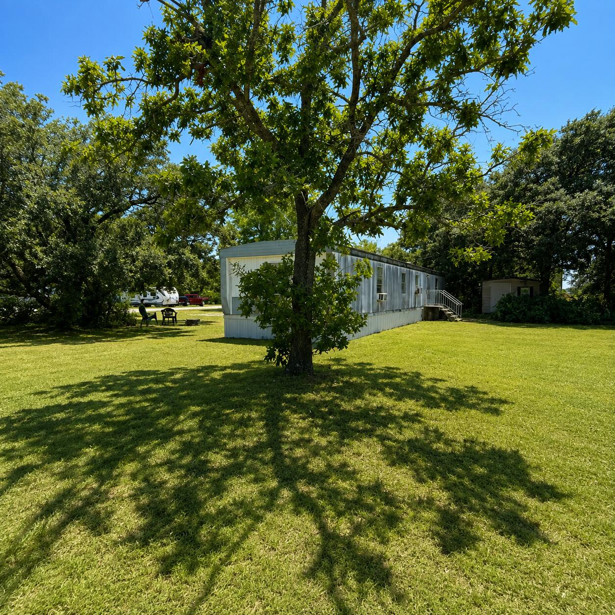 Investment Opportunity with Immediate Income!

Looking to grow your real estate portfolio? This oversized lot offers the perfect combination of current cash flow and future potential!

Situated on a quiet street in a desirable neighborhood, this property features a leased mobile home (as is /repairs needed), providing immediate rental income from day one. Whether you're an experienced investor or looking to purchase your first income-producing property, this is a fantastic opportunity.

The large lot offers plenty of room for future possibilities while the convenient location puts you just minutes from shopping, restaurants, and the area's new high school. With easy access to everyday amenities and a peaceful setting, this property is attractive to both tenants and future buyers.

Property Highlights:

Income producing property with a leased mobile home, large lot with future potential, established neighborhood
minutes from shopping, dining, and everyday conveniences, and near the new high school!

Excellent opportunity for investors or those seeking passive rental income

Don't miss your chance to own a property that generates income today while offering long term investment potential.