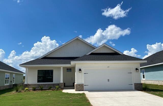 This popular Craftsman-style 3BR/2BA home (currently under construction: (Est. Aug/Sept completion) is ideally located in the back of the Community backed up to the woods. Designed with both comfort and style in mind, the home features HardieBoard® siding with a brick skirt, vaulted ceilings,  and CoreTec Pro Plus luxury vinyl plank flooring throughout--no carpet. The spacious primary suite boasts elegant tray ceilings, a generous walk-in closet, and a spa-inspired bath. Quartz countertops in the kitchen and baths, soft-close cabinetry, spacious covered patio complete this inviting home, perfect for relaxed everyday living and entertaining. Riverwalk residents enjoy a community pool, clubhouse, fitness center, scenic nature trail, and neighbor hood dock, offering plenty of opportunities to get outside and enjoy the Florida life style.  *Pics are of a similar home.*