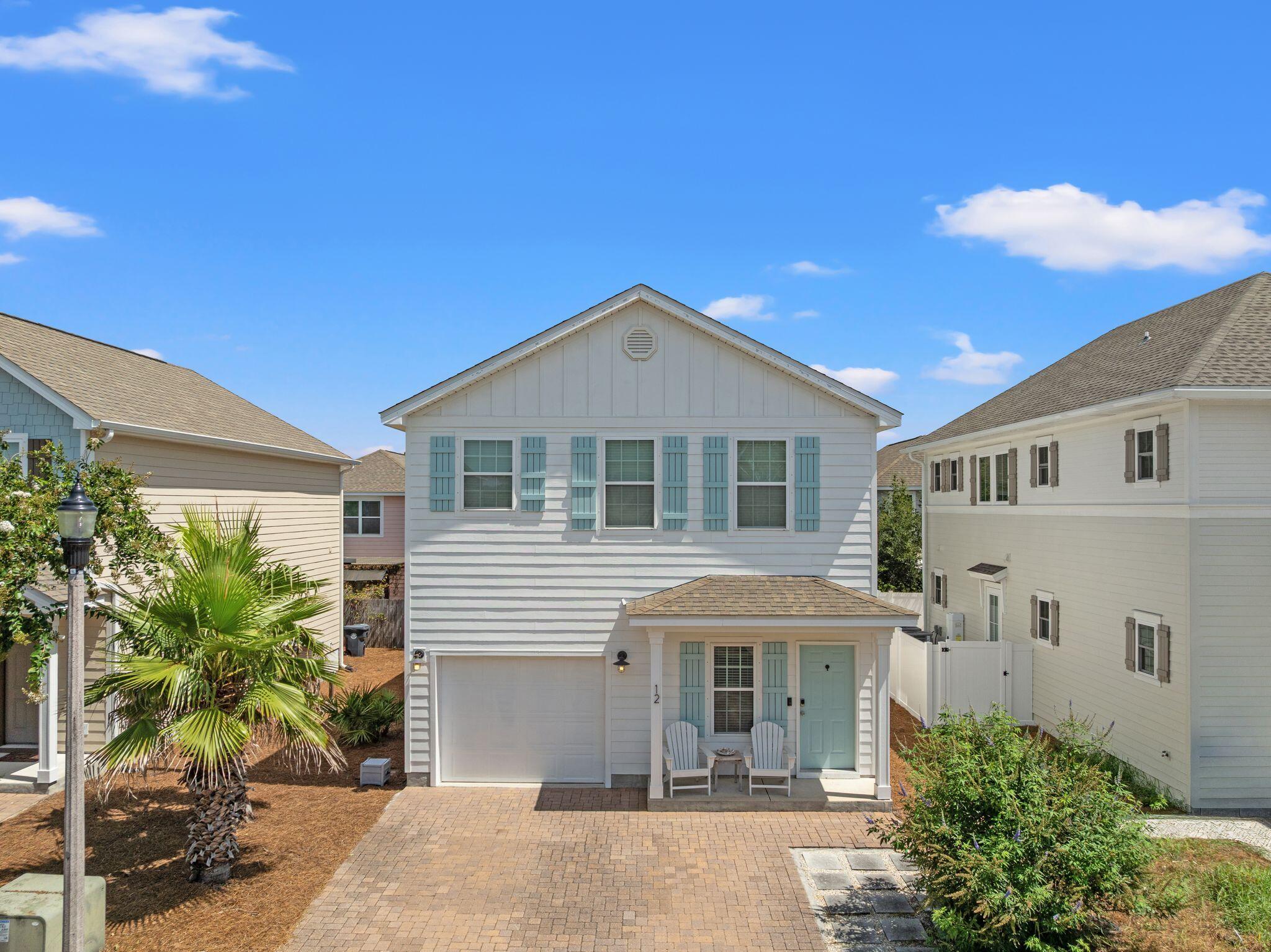 Located in the desirable West Shore Place community of Inlet Beach, this 3-bedroom, 2.5-bath home with a one-car garage offers an open-concept floor plan and a prime location. The kitchen features quartz countertops, stainless steel appliances, a gas range, subway tile backsplash, and overlooks the spacious living and dining areas. Upstairs, the primary suite includes a double vanity, soaking tub, and separate shower, while the guest bedrooms share a Jack-and-Jill bath with individual vanities.
Additional features include hardwood flooring on the main level, a tankless water heater, two HVAC systems, a brick paver patio, irrigation system, and community pool. Enjoy this quiet neighborhood while still being easy walking distance to 30A, shopping/dining at 30Avenue, Rosemary Beach, and all that 30A has to offer.
