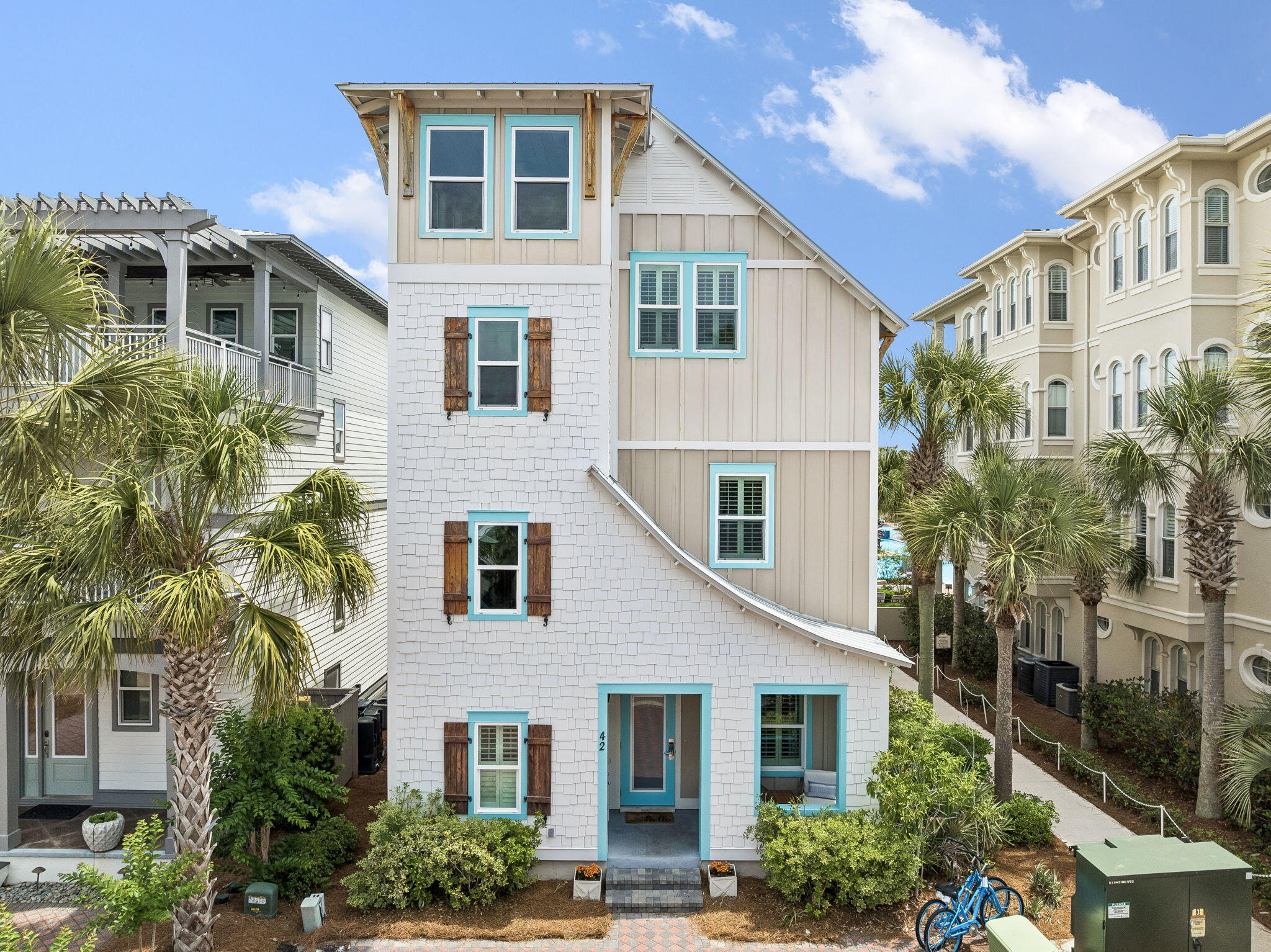 Situated in a prime location between Alys and Rosemary Beach, this property offers nearly 2,900 square feet of thoughtfully designed living space, making it an idyllic setting for everyday living, entertaining, or a vacation rental investment. The home features an open floor plan across three levels:- First Floor: Includes two bedrooms, two full bathrooms, a bunk room, and a living area with a wet bar, along with direct access to the pool from your private outdoor covered dining and lounging deck. - Second Floor: The main living area boasts built-in shelving, a gas fireplace, and a guest room with an ensuite bath. The chef's kitchen is equipped with ample cabinetry, a large island, and a stainless steel appliance suite. - Third Floor: Offers a private master suite with soaring vaulted ceilings, a separate sitting room, and a luxurious bathroom with a walk-in shower and soaking tub. An additional hidden bunk room is also located on this level. You can also enjoy convenient tram service to the beach, 12,000-square-foot pool with a poolside café and all the shops and restaurants 30A has to offer.
