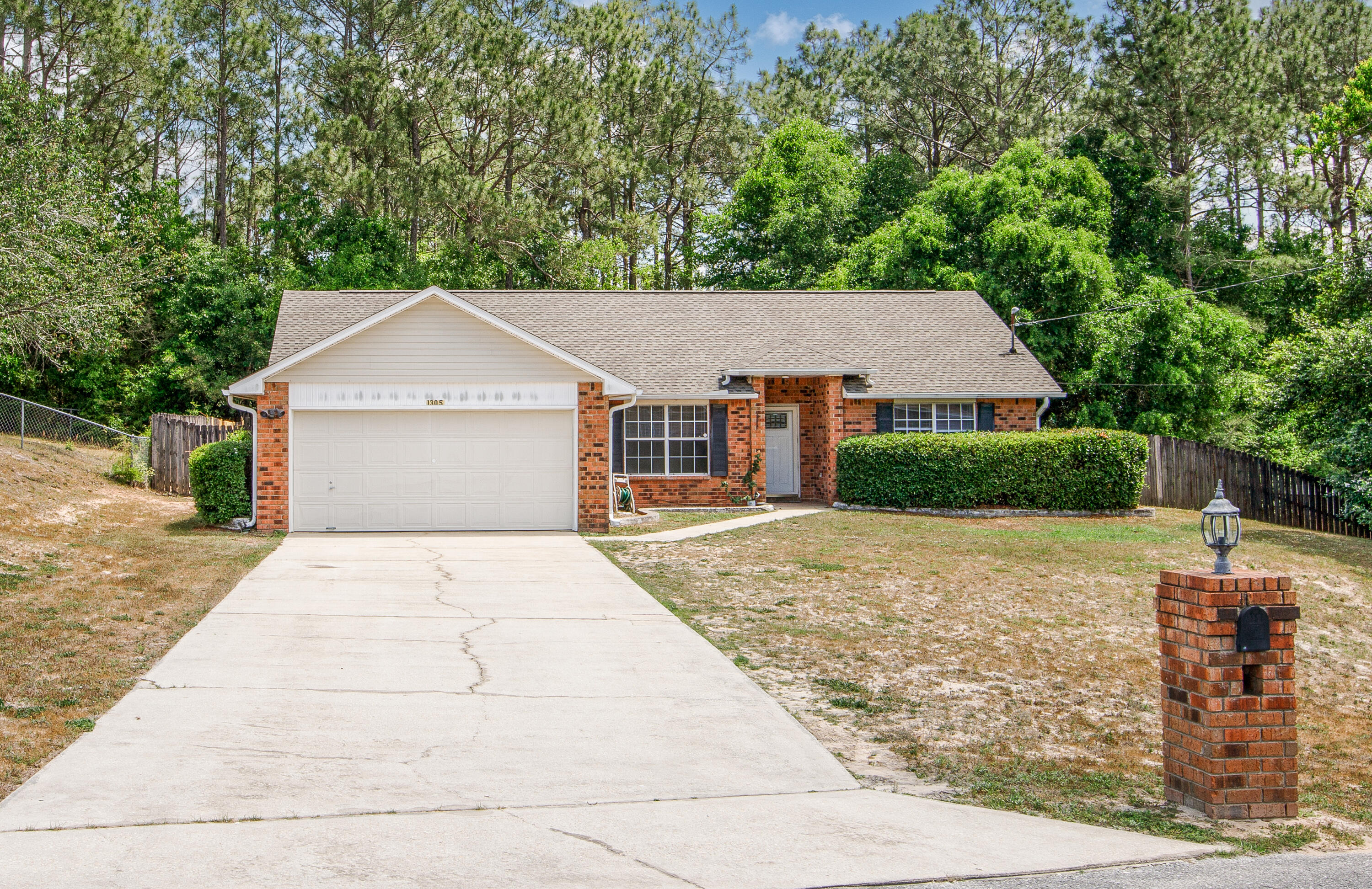 Assumable loan : 2.6% rate
Welcome to this beautifully updated 3-bedroom, 2-bath brick home located on a quiet cut-de-sac in the sought-after south end of Crestview. Inside, you'll find fresh paint, new LVP flooring, soaring ceilings, and a well-designed split floorpan that offers both comfort and privacy. The inviting living area features a cozy wood-burning fireplace, while the spacious kitchen provides plenty of cabinet and counter space. Step outside to a screened in patio overlooking a large, fenced backyard- perfect for relaxing or enjoying your morning coffee. Roof -2022, HVAC-2020.