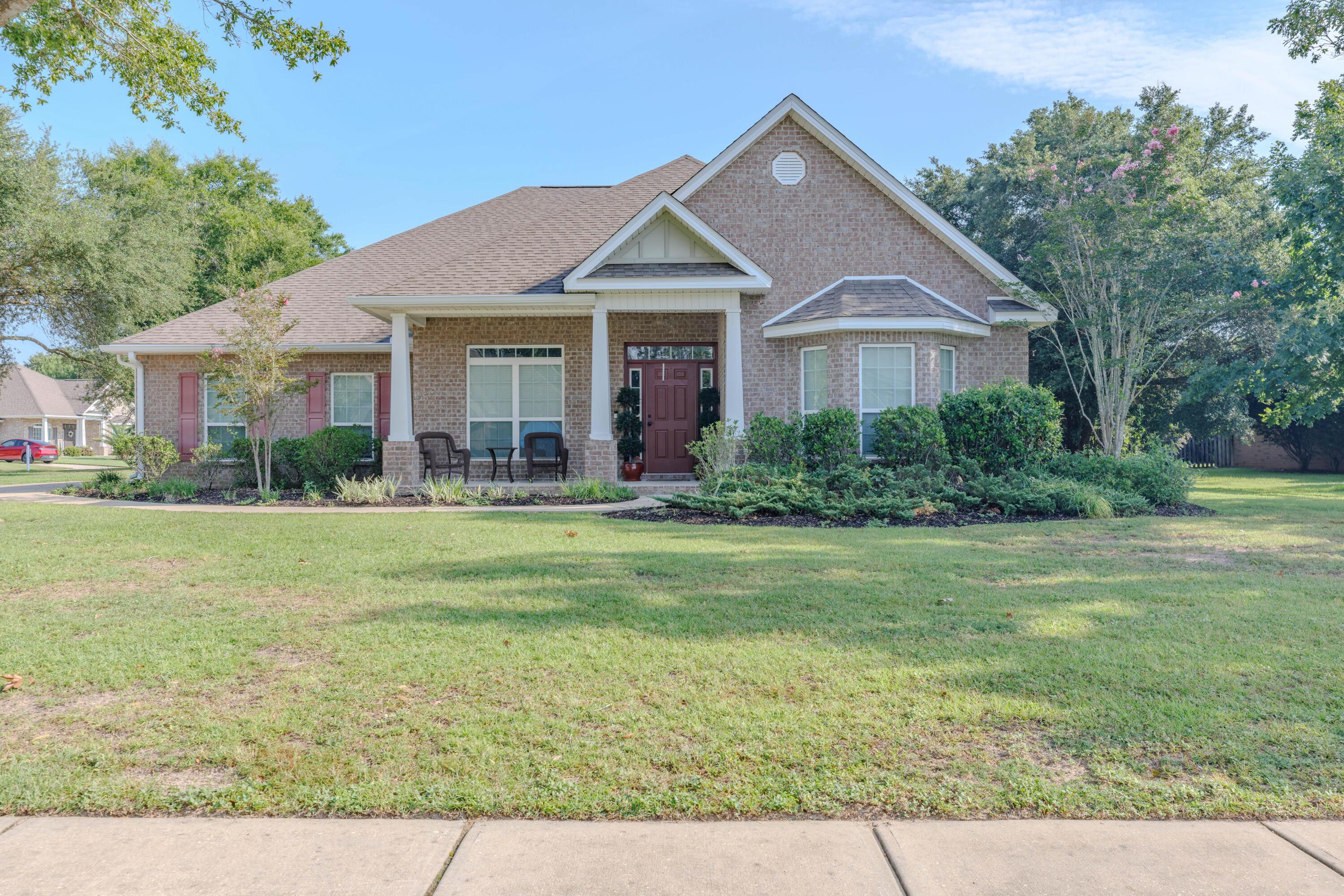 Stunning 5-Bedroom All-Brick home on a Premium Corner Lot in Habersham subdivision! Welcome home to this immaculate, highly sought-after 'McKenzie' floor plan. Nestled on a sprawling 0.44-acre lot in the heart of Pace, this 2015-built home perfectly blends functional modern design with timeless Southern charm. Step inside to find a grand, open-concept split floor plan spanning 3,121 square feet of meticulously maintained living space. The expansive great room flows effortlessly into a gourmet kitchen, making it an absolute dream for entertaining. With 5 generously sized bedrooms and 3 full bathrooms, this layout offers unparalleled versatility for large families, multi-generational living, or dedicated home offices. Outside, the massive corner lot provides a blank canvas for your dream backyard oasis--whether you envision a luxury pool, playground, or a pristine garden. Living in Habersham means enjoying a quiet community, sidewalks-lined all while being zoned for top-rated Santa Rosa County schools (including Sims Middle and Pace High). Don't miss your chance to own one of the largest and most functional floor plans in the area. Schedule your private tour today!