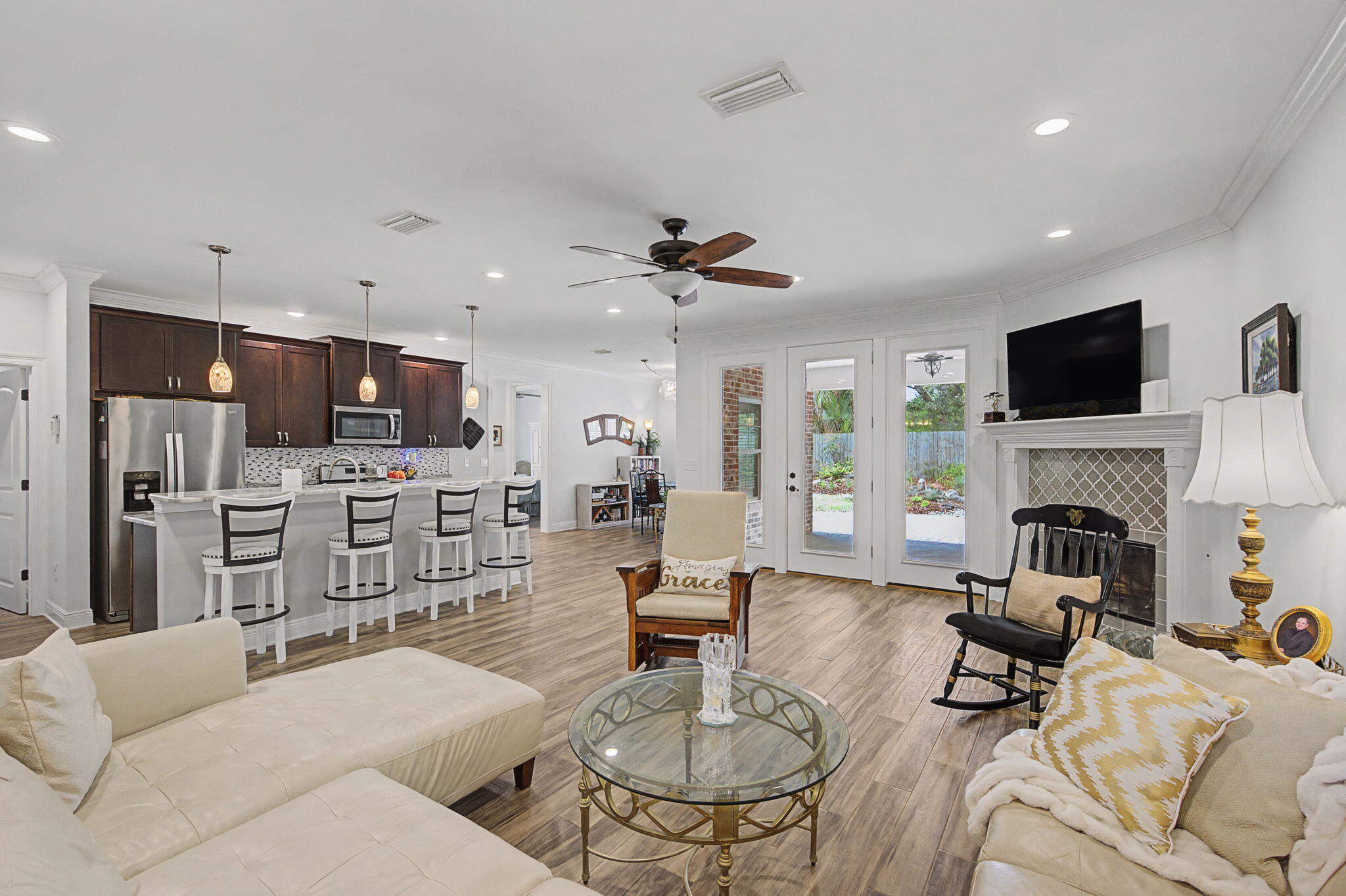 Welcome to this beautifully maintained brick home in the highly sought-after Elliott Point neighborhood -- a charming golf cart community perfectly positioned near the water and just minutes from downtown Fort Walton Beach, local restaurants, waterfront parks, concerts in the park, and the area's stunning white-sand beaches. With the downtown district quickly becoming one of the hottest destinations along the Emerald Coast, this is a rare opportunity to enjoy the perfect blend of relaxed coastal living and vibrant community life.
Designed with both comfort and entertaining in mind, the home features an inviting open floor plan centered around a spacious kitchen complete with a large island, breakfast bar, stainless steel appliances, and a gas range. Just off the kitchen, you'll find a cozy breakfast nook along with an elegant formal dining space ideal for hosting family and friends.
Offering four bedrooms, the flexible fourth bedroom can easily serve as a home office, guest suite, or additional living area. The expansive primary suite creates a private retreat with a large walk-in closet and a spa-inspired en suite bath featuring dual vanities, a soaking tub, and a separate shower designed for ultimate relaxation.
Step outside and discover one of the home's most unique features -- a thoughtfully curated pollinator garden that transforms the backyard into a peaceful natural sanctuary. Filled with native plants and seasonal blooms, this eco-friendly landscape attracts butterflies, hummingbirds, and bees, creating a colorful, ever-changing setting you can enjoy year-round. Whether you're enjoying your morning coffee on the patio or entertaining guests in the evening, the outdoor space offers beauty, tranquility, and sustainable low-maintenance living.
Additional upgrades provide comfort, efficiency, and peace of mind, including a whole-house surge protection system, UV light technology integrated into the HVAC system for cleaner indoor air, and gutter guards for easy exterior maintenance year-round.
26 SE Okahatchee Avenue is more than just a home -- it's an opportunity to be part of one of the Emerald Coast's fastest-growing and most exciting waterfront communities.