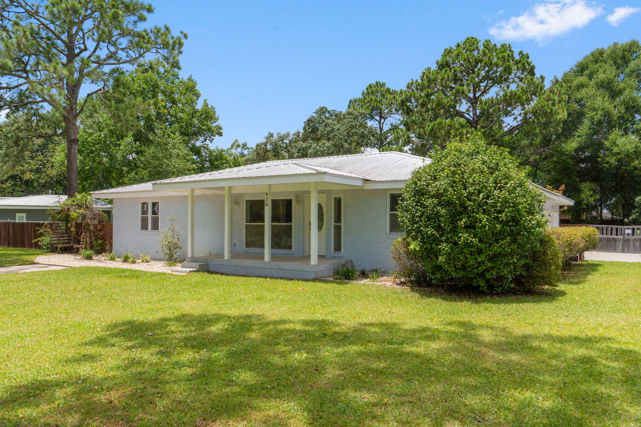Do NOT let the age fool you! Beautifully renovated/remodeled home on a .46 acre corner lot with Bay views in the desirable Garniers Beach area. This home offers 4 bedrooms, 2 baths, separate office & familly room. There is beautiful natural light, crown molding, & a ton of storage throughout the home. Enjoy Garniers Beach which is a short walk away. This neighborhood amenity offers 240 ft of beach with a designated swimming area, boat launch, playground & picnic tables. Schedule your viewing today & make this your forever home!
