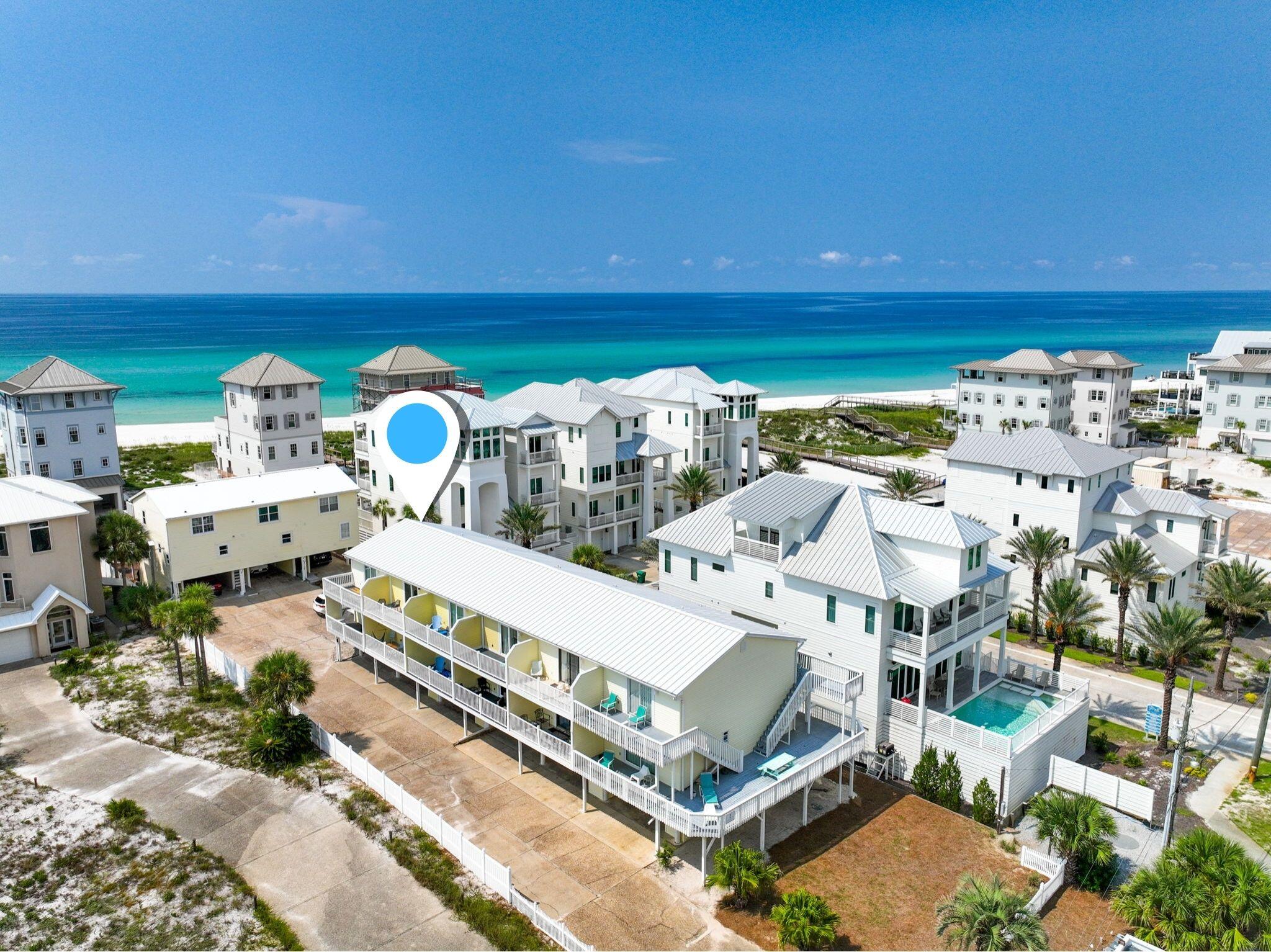 Inlet Beach SOUTH OF 98!  Gulf views and fantastic beach access!  Biking distance to Rosemary Beach. Sold fully furnished. And yes--it's a corner unit! Welcome to Shoreline Townhouses Unit 4, a rare opportunity to own a coastal retreat that blends location, outdoor living, and comfort in one.
Being the corner unit means you get more than just the standard setup. Along with the two patios found in every townhouse, this home offers an additional open deck with partial cover--creating over 300 square feet of outdoor living space. Imagine grilling out, entertaining friends, or simply unwinding with the backdrop of Camp Helen State Park's rolling dunes.
Practicality is built in too. Covered parking easily fits one vehicle, with additional outdoor storage for all your beach gear. After a day on the sand or at nearby Phillips Inlet, rinse off in your private outdoor shower before heading inside. Phillips Inlet is a local favorite for launching kayaks, paddleboards, or even a small boat making adventure part of your everyday lifestyle.
Inside, the first floor welcomes you with a spacious living area and sliding glass doors leading to the covered patio. The kitchen is highlighted by granite countertops and direct access to the extended deck, creating a seamless indoor-outdoor flow that's perfect for entertaining. You'll also find a convenient laundry/half-bath combo tucked away on this level.
Upstairs, retreat to two private bedrooms, each with its own ensuite bath and walk-in closet. One of the bedrooms opens onto a second-floor deck where Gulf views greet you each morning.
What makes this spot truly special is its balance of seclusion and convenience. While you'll enjoy the peace and quiet of being tucked behind a state park, you're still just minutes away from Rosemary Beach and the excitement of 30A. Hop on a bike or golf cart to explore the area, or take the Inlet Beach Underpass to 30Avenue, where you'll find favorites like Idyll Hounds Proper, Amici, and a variety of boutique shops.
Shoreline Townhouses Unit 4 offers the best of both worlds close to everything, yet private and peaceful. Whether you're searching for a beach getaway, an investment property, or a full-time residence, this home delivers a coastal lifestyle that's hard to match.