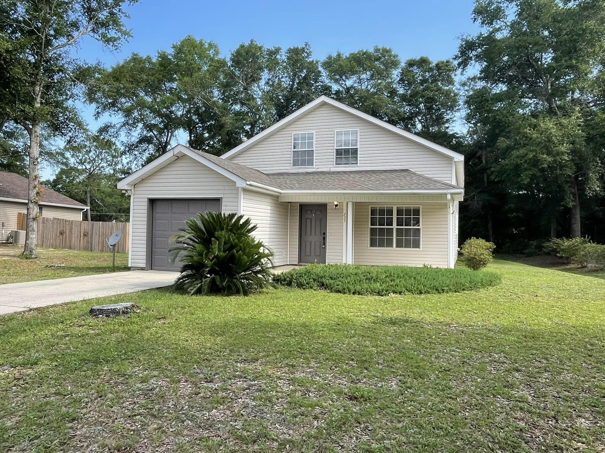 Available June 1st the desirable Timberwind Subdivision of DeFuniak Springs, this well-maintained 4-bedroom, 2-bath, two-story home offers comfort, space, and convenience.
The home features a spacious open floor plan with a bright living area, a fully equipped kitchen with ample cabinet and counter space, and a dining area perfect for everyday living or entertaining. The primary bedroom is located on the main floor for added privacy, while additional bedrooms upstairs provide flexibility for family, guests, or a home office.
Enjoy outdoor living with a private backyard, ideal for relaxing or gatherings. This home offers a peaceful neighborhood setting while still being just a short drive to local schools, shopping, and dining options in DeFuniak Springs.
